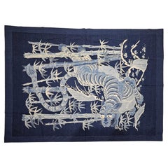 Textile indigo japonais artisanal représentant un tigre dans une forêt de bambou