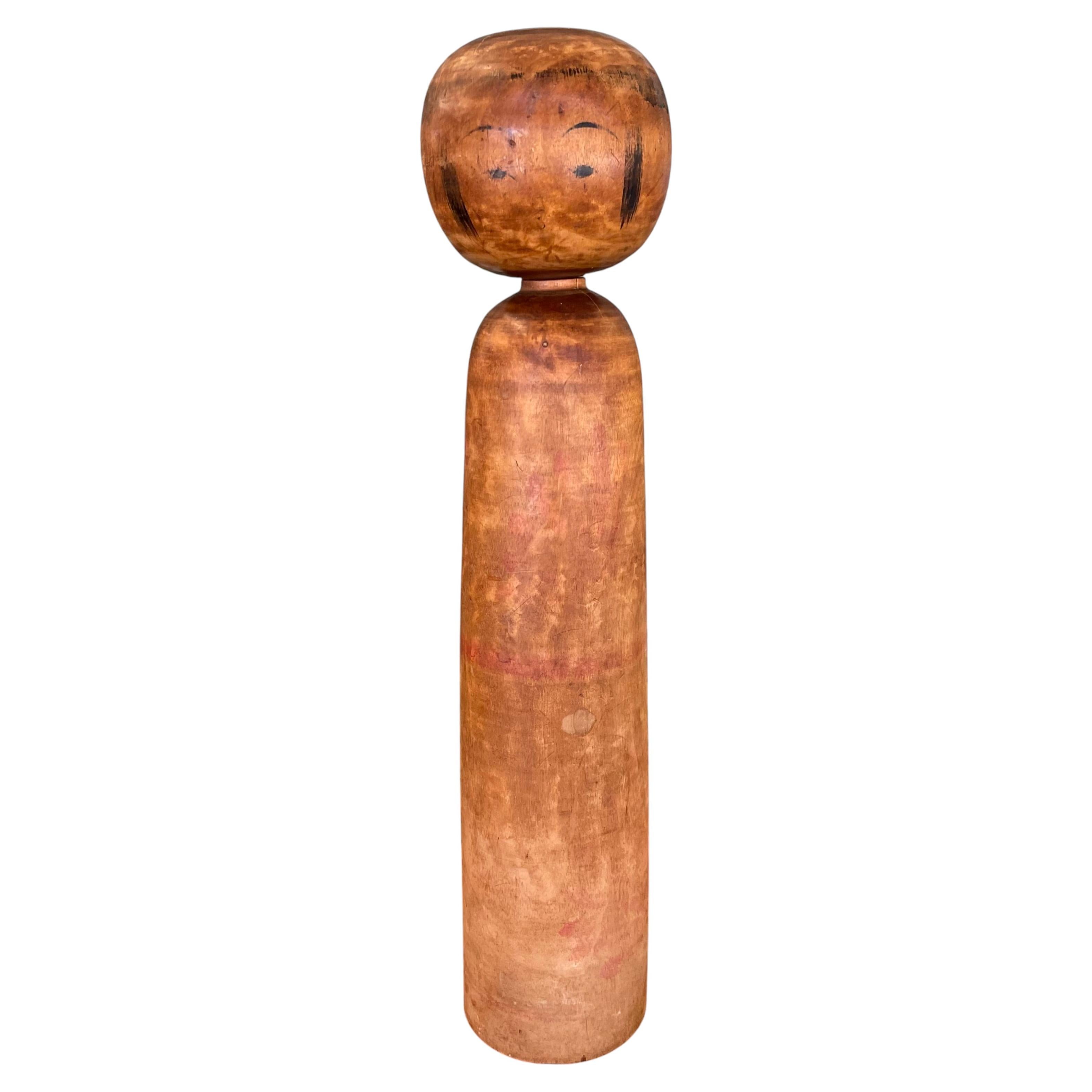 Vintage Japanese Kokeshi Doll with Hand-Painted Floral Detail.