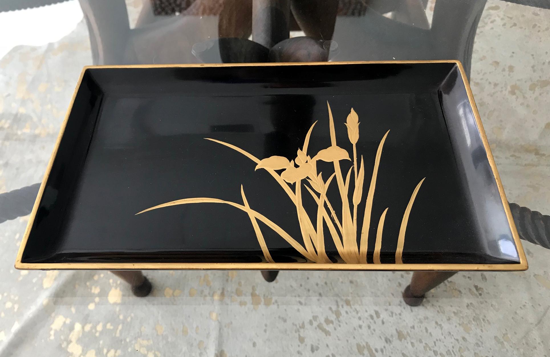 A rectangular black lacquer tray from Japan circa 1940-1960s of the Showa era. Decorated with Iris leaves and blossom and gilt trim. Medium size and very elegant in presence.
 