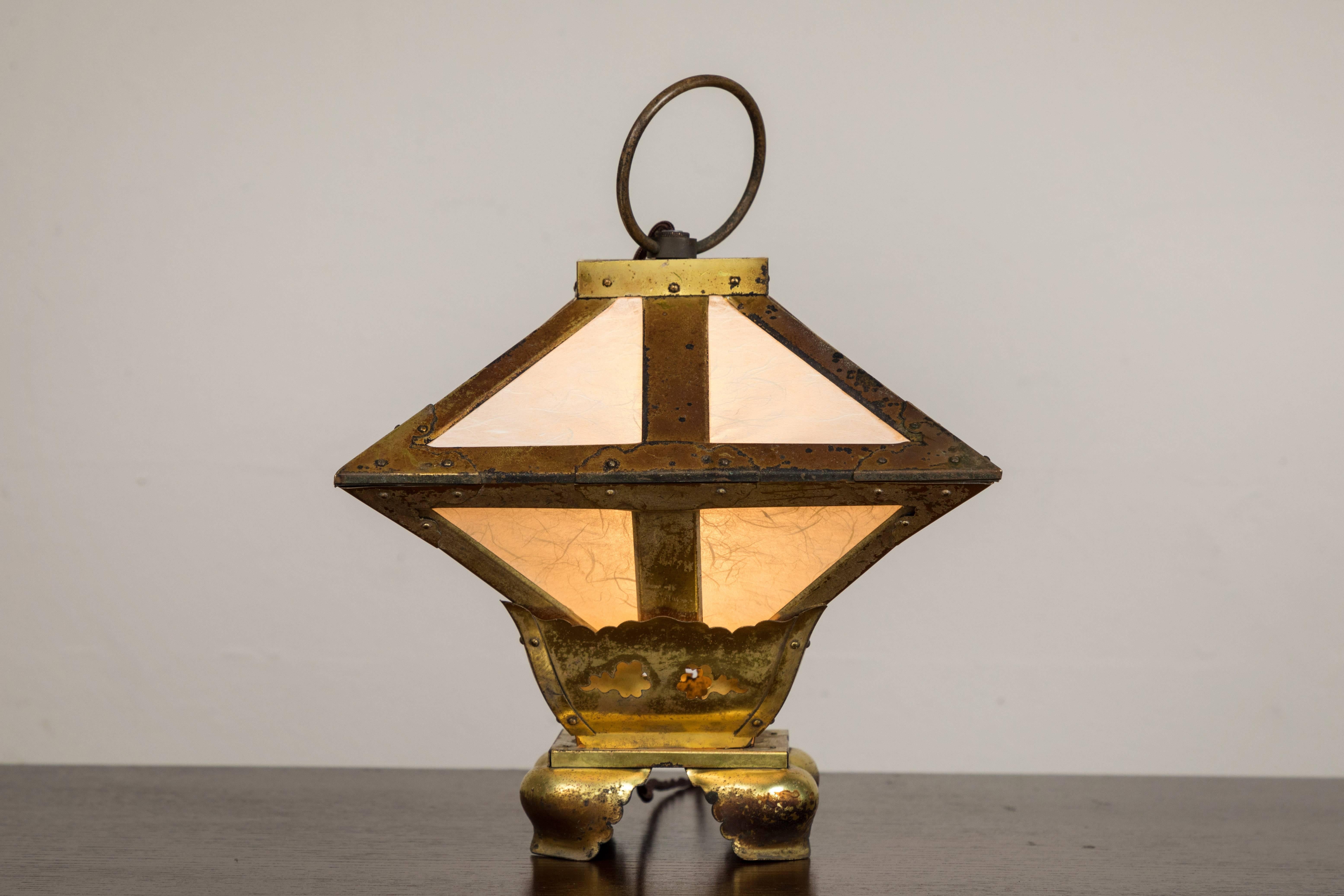 Early 20th century brass light with Japanese paper (has been replaced). Updated wiring and hardware. Can be used as a table or hanging lamp.  