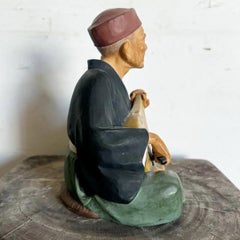 Muñeca japonesa vintage de arcilla de Leftons de un anciano tocando una Biwa