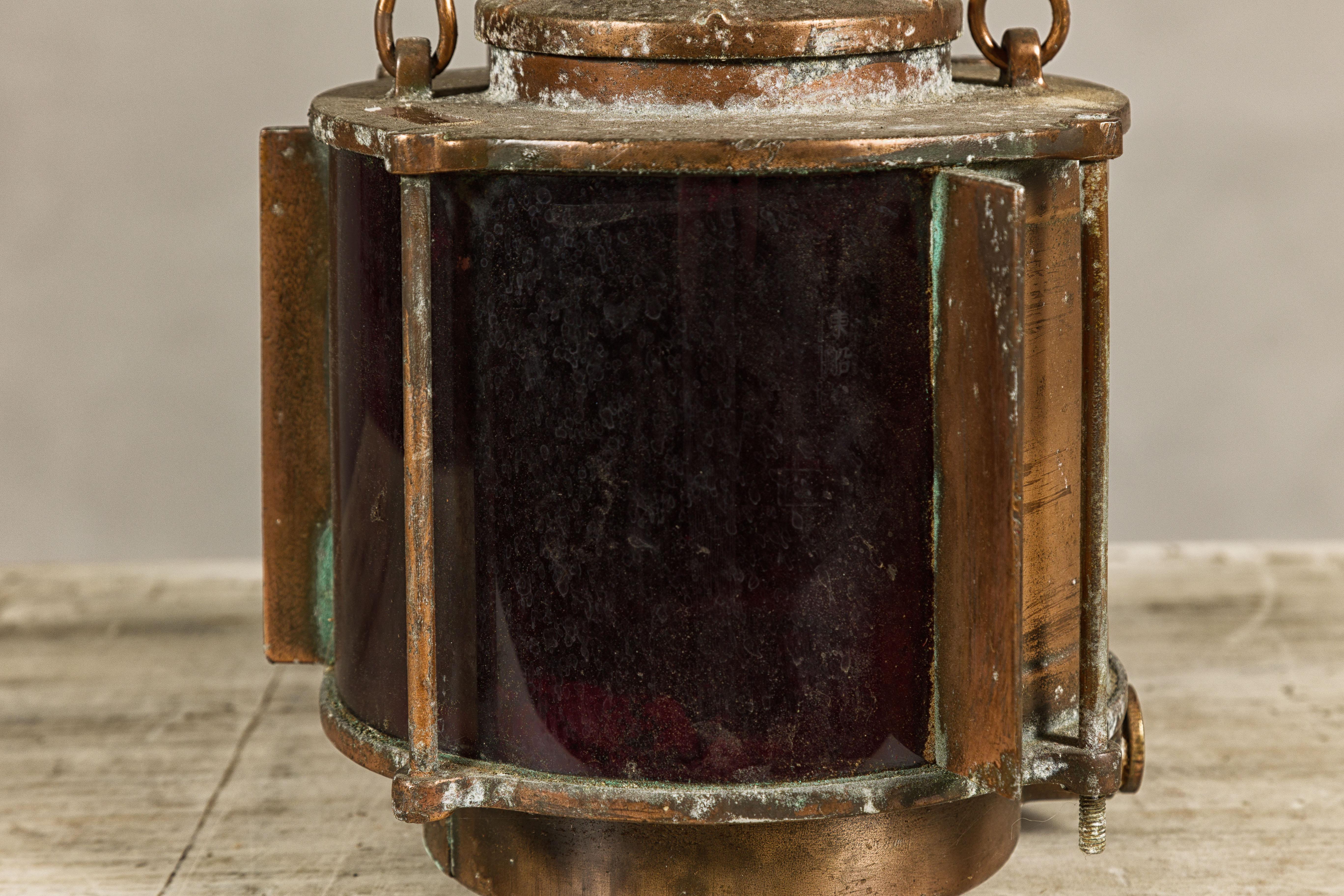 Vintage Japanese Metal Ship Lantern with Red Glass Panel and Weathered Patina 2