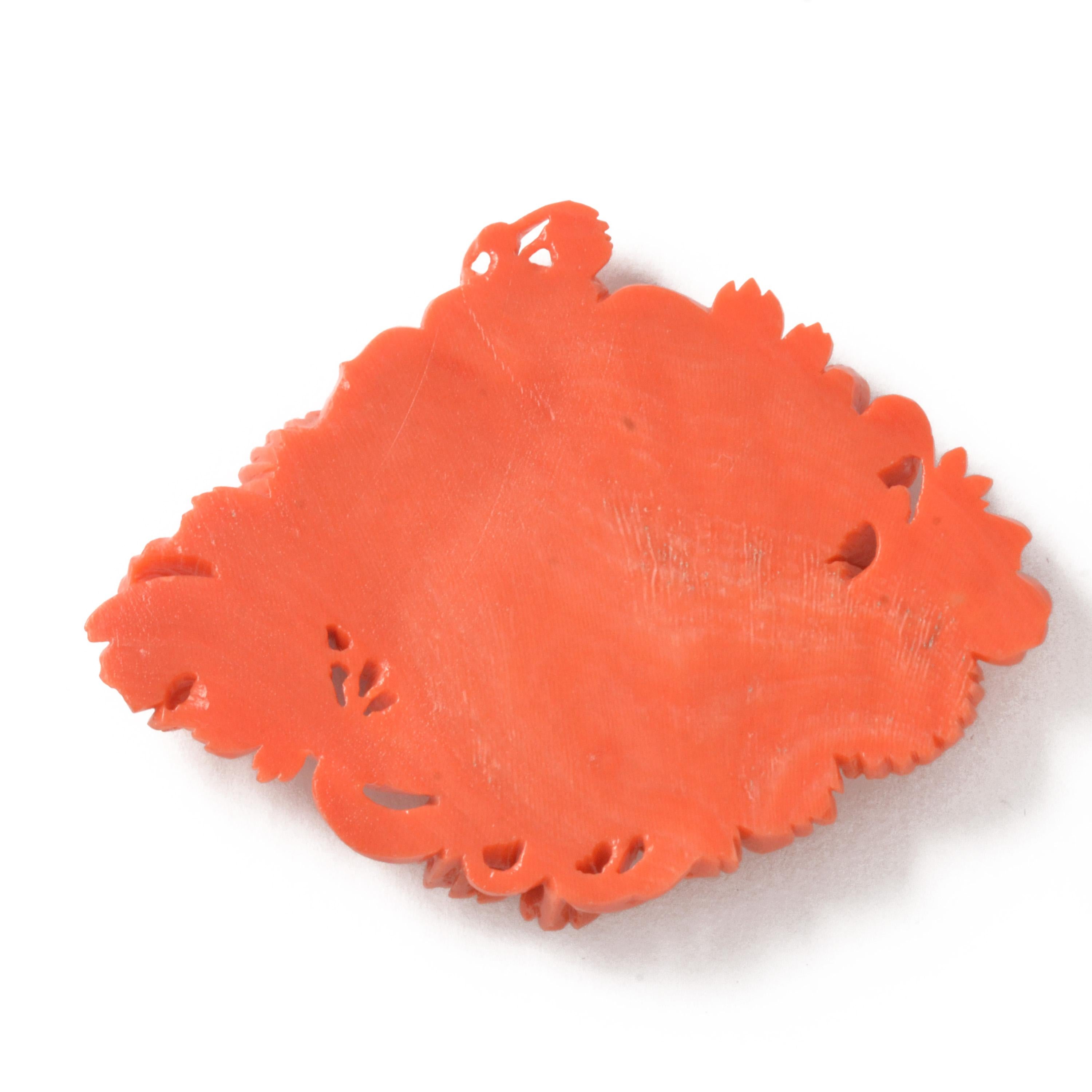 This vintage Japanese Momoiro Sango coral plate is delicately carved from thick coral logs and high-quality material with very little color unevenness. The unique design includes a scene of butterflies and pompon chrysanthemums. There is also