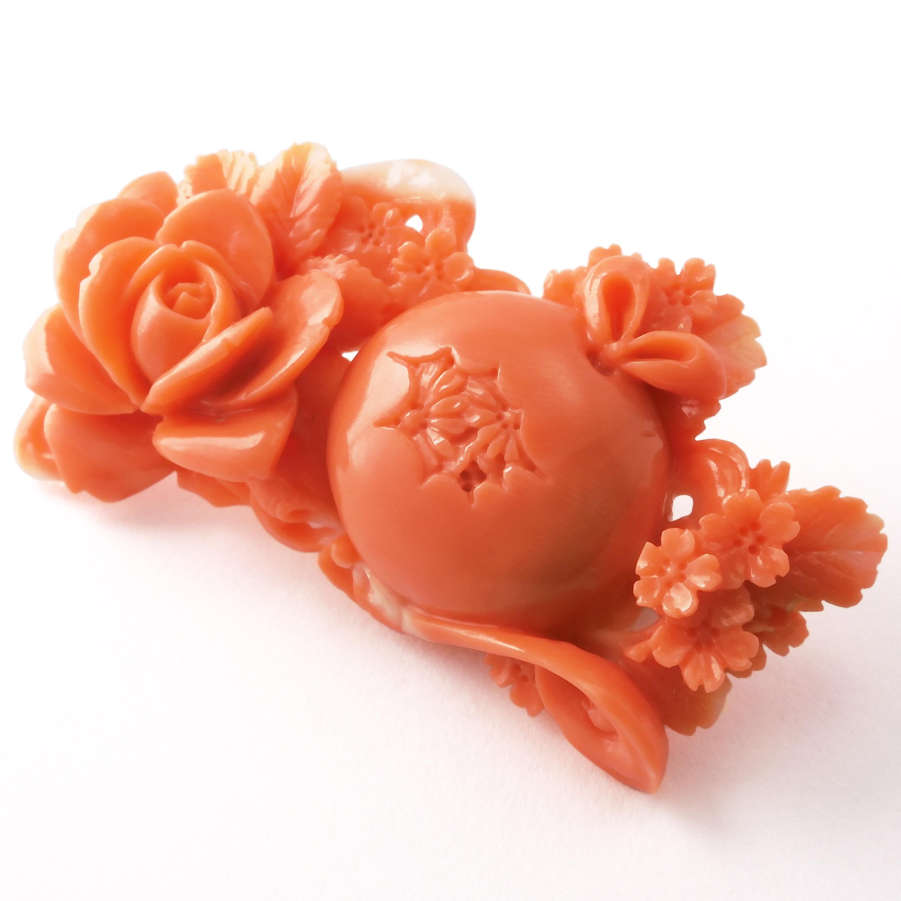 This vintage Japanese Momoiro Sango Coral plate is delicately carved into Rose and Primrose Flowers. The carving is three dimensional and decorated with detailed flowers.  The height of craftsmanship is evident in this fine carving.

About the