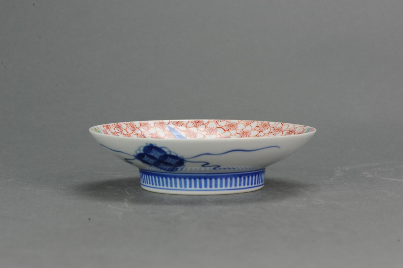 A very nice bowl footed bowl in Nabeshima style

Additional information:
Material: Porcelain & Pottery
Region of Origin: Japan
Period: 20th Century
Condition: Overall Condition Close to Perfect -1 very small frit.
Dimension: Ø 15.3 x 4 H cm