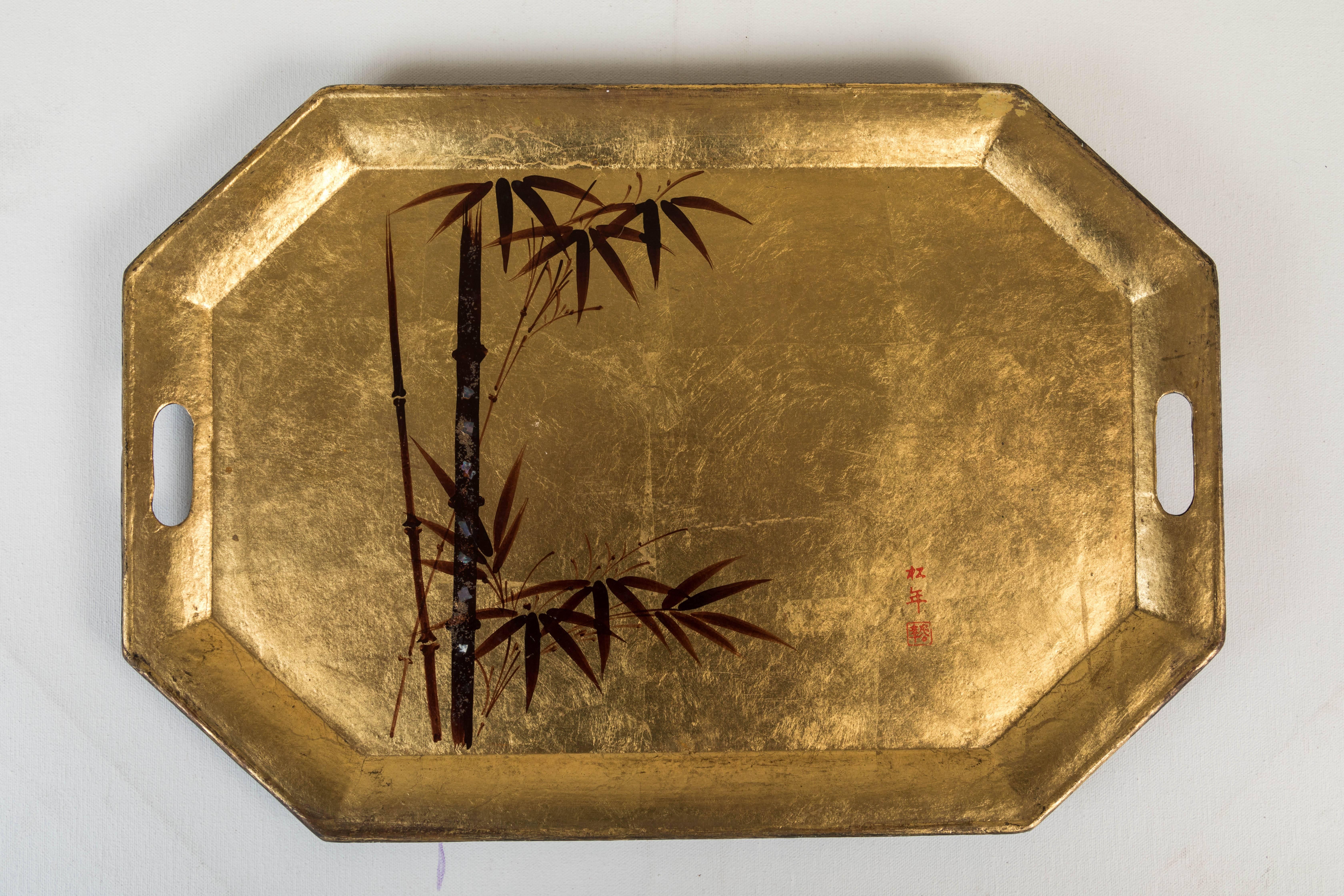 Gold leaf with nacre inlay. Mid Century tea trays.