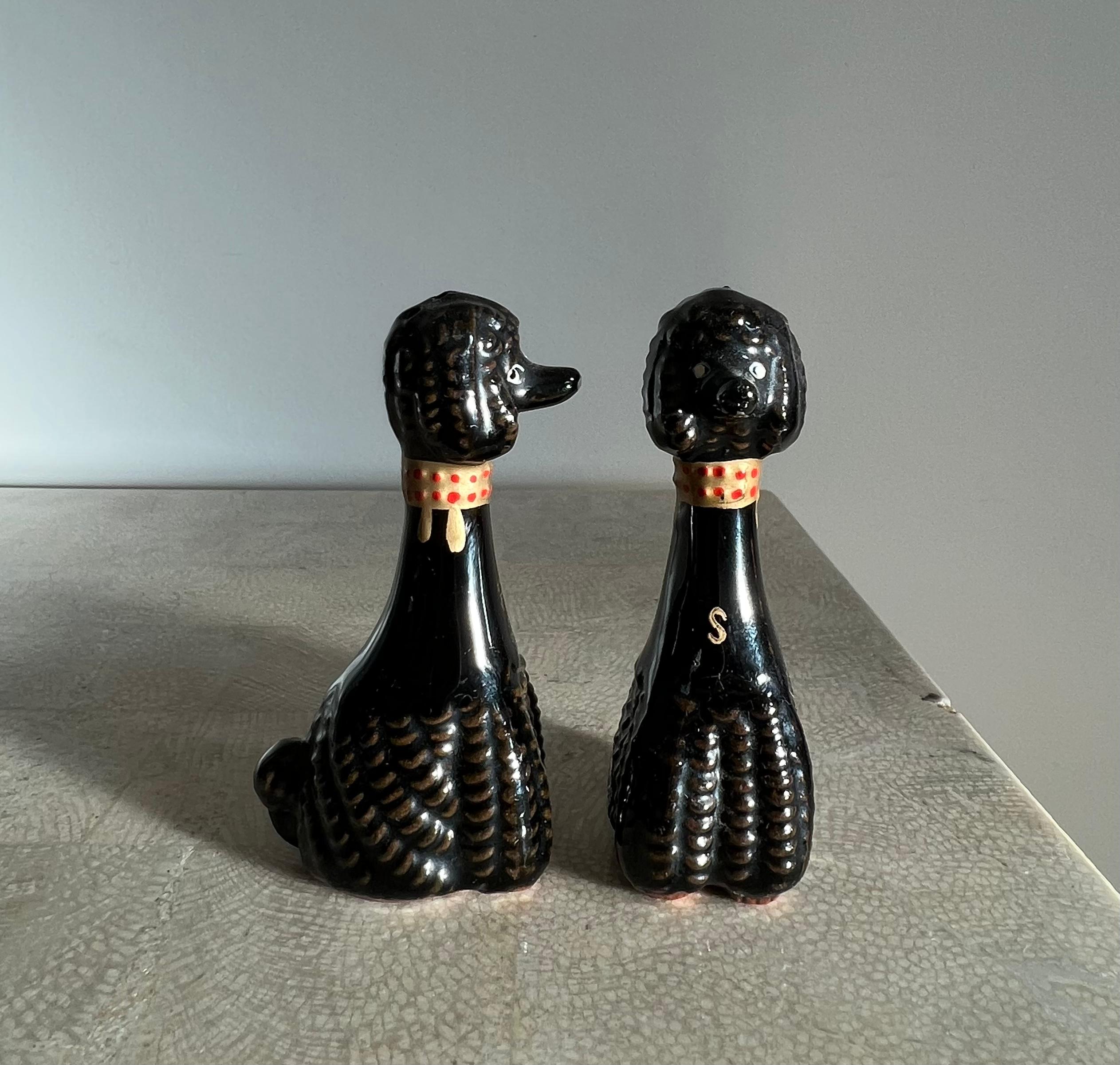 antique black salt and pepper shakers