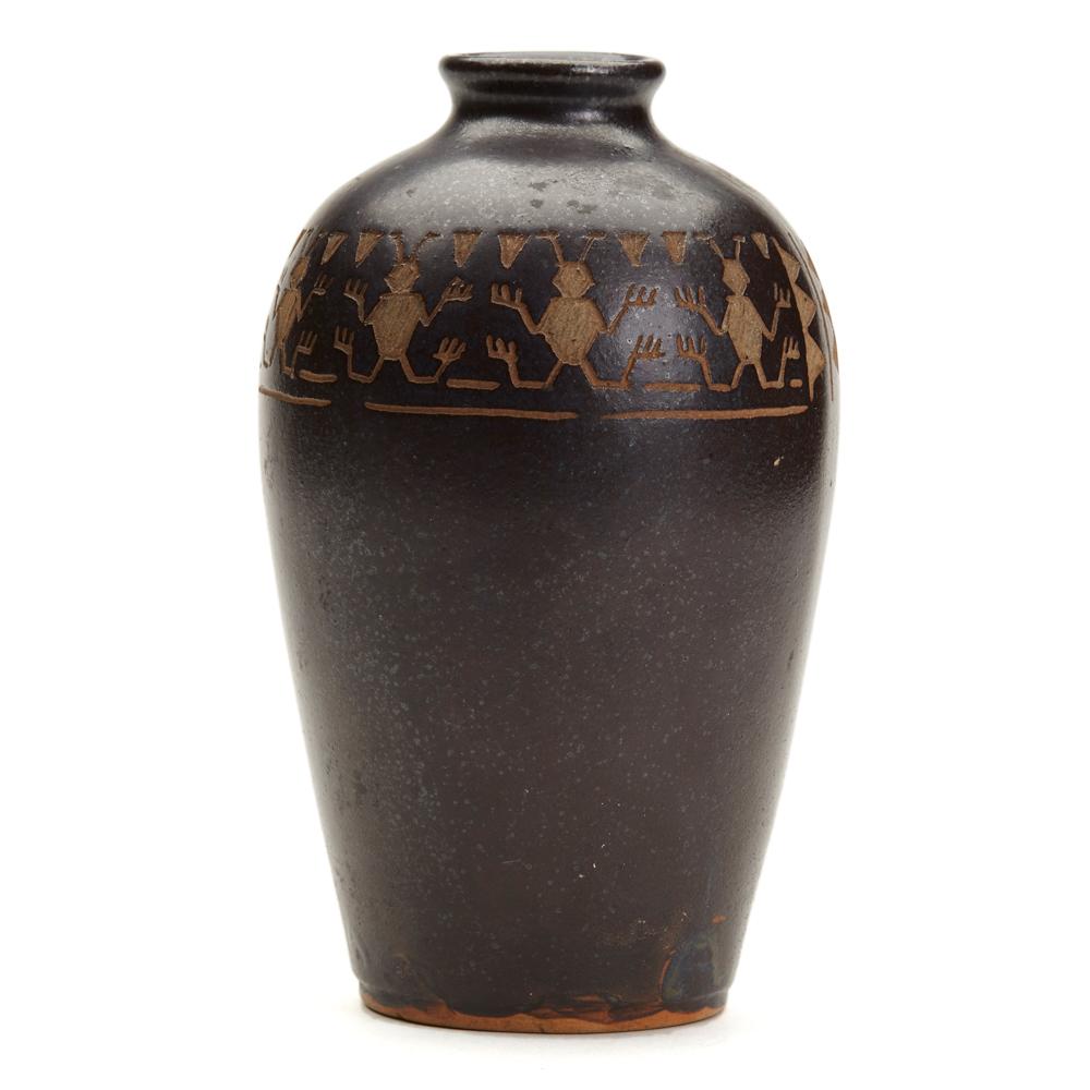 An unusual vintage Japanese studio pottery vase decorated with stylized insects and signed to base. The bulbous stoneware vase stands on a flat unglazed base and is decorated in brown glazes with a band of insects which appear to have been incised