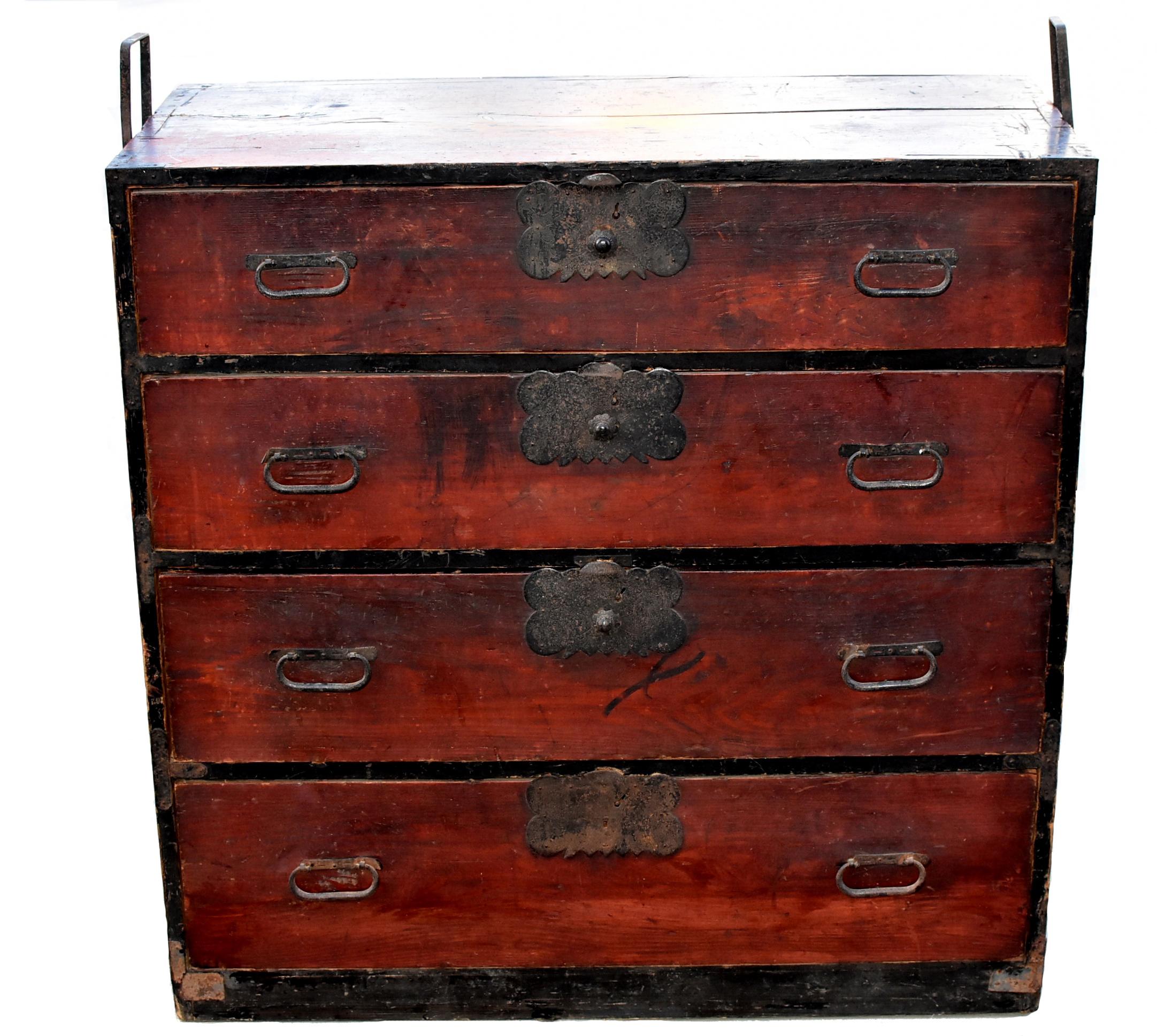 A beautiful antique, Meiji period, Japanese Tansu with four large full capacity drawers. Unique, solid iron hardware are all original. Solid wood. Back of the chest has Japanese ink brush calligraphy. All our antique furniture are touched up and