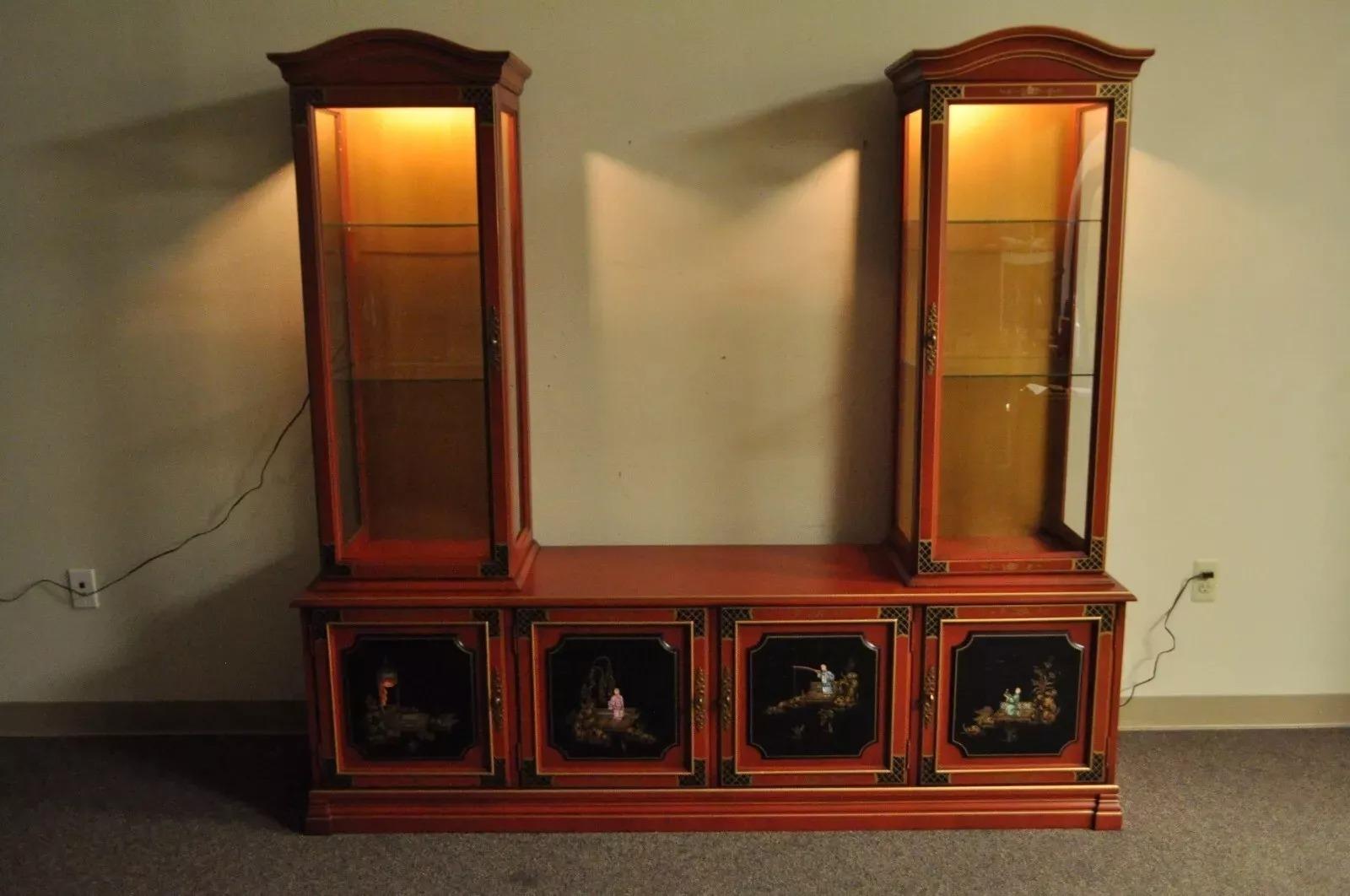 Vintage Jasper Oriental Chinoiserie Red Display China Cabinet Curio Credenza. Item features high quality solid wood construction, red painted finish with gold trim, hand painted scenic front and side panels, curved glass upper doors, 4 adjustable