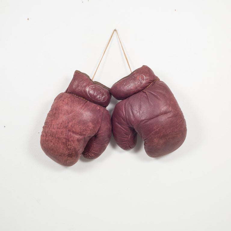 About

These are authentic vintage boxing gloves with reddish, brown leather. Each glove has tan leather piping and laces. The leather is very soft and is good condition. Stamped J.C. Higgins label on each glove. 

 Creator J.C. Higgins, USA.
Date