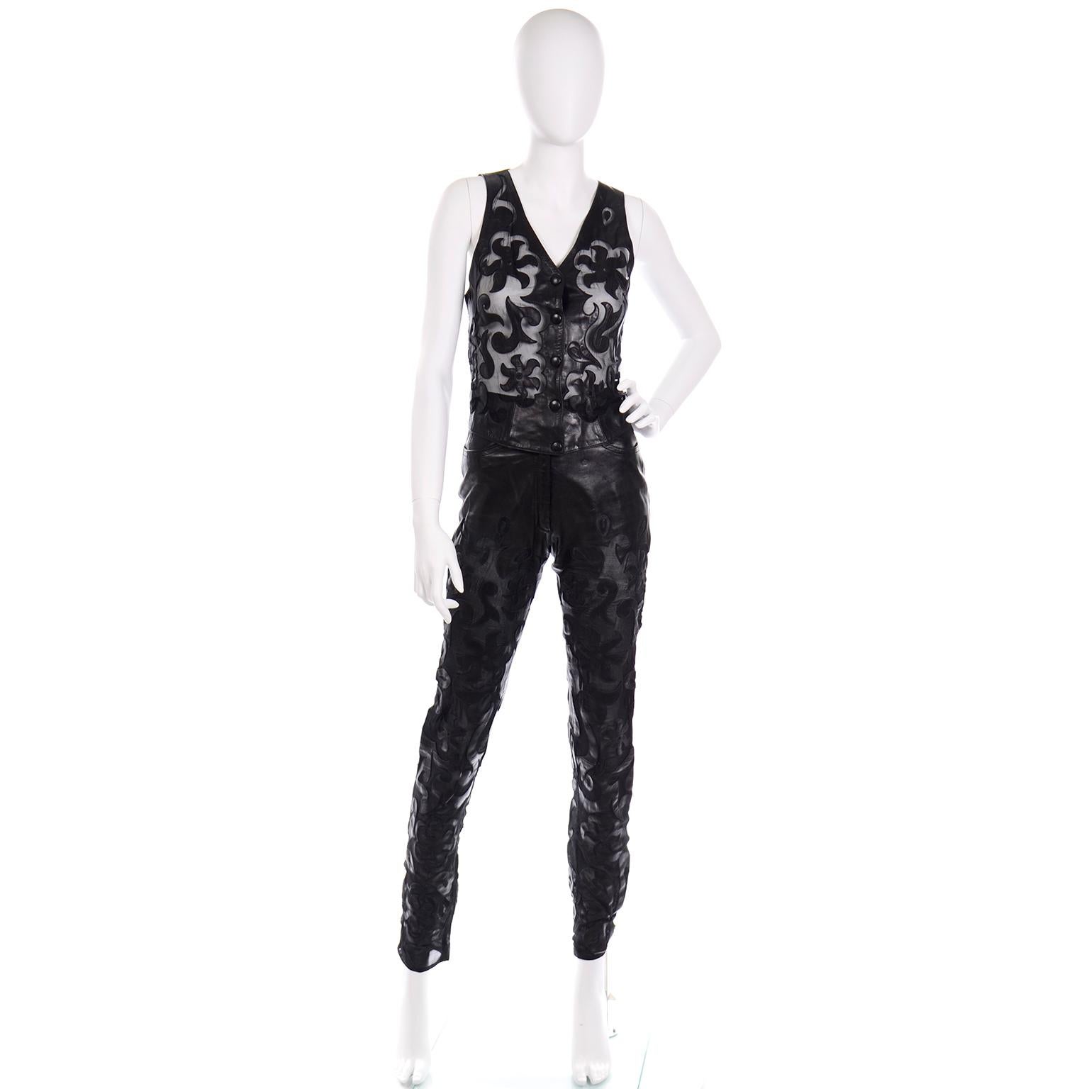 This incredible vintage 1990's Jean-Claude Jitrois leather outfit is truly sensational and definitely a show stopper! This vest and pants ensemble has beautiful black leather and sheer black silk cutout designs throughout the top and the pants. The