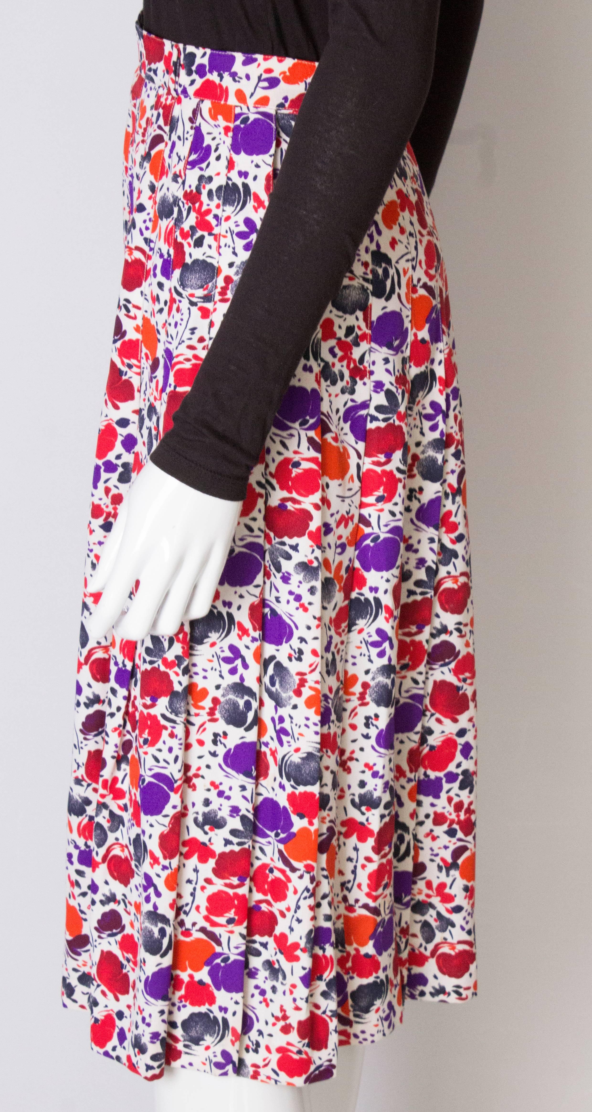 A vintage 1980s floral printed pleated numbered Skirt by Jean Louis Scherer 1