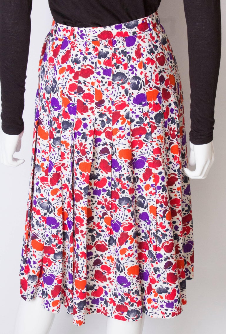 A vintage 1980s floral printed pleated numbered Skirt by Jean Louis ...