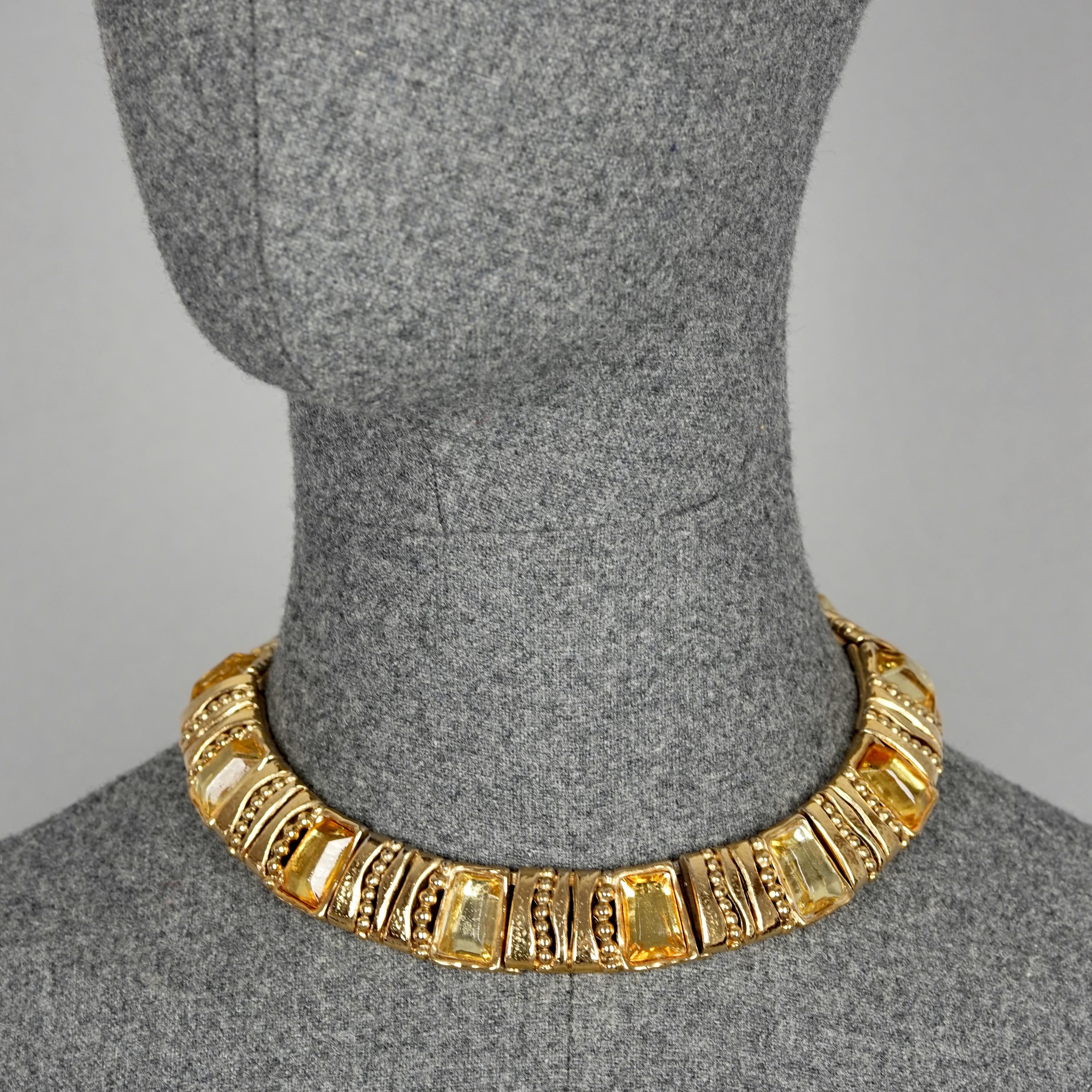 Vintage JEAN LOUIS SCHERRER Citrine Articulated Choker Necklace

Measurements:
Height: 0.78 inch (2 cm) 
Inside Length: 13.77 inches (35 cm)

Features:
- 100% Authentic JEAN LOUIS SCHERRER.
- Gilt and citrine resin link articulated choker