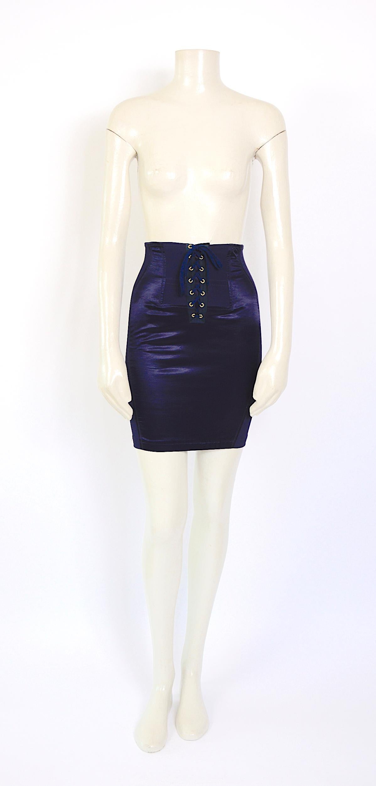 Collectible icon piece!!
Jean-Paul Gaultier vintage 1980s corset-inspired bleu spandex and satin skirt.
Beautiful vintage condition, the rubber elasticized panels allowing side stretch on the side included. 
Material: cotton-viscose- polyamide
Made