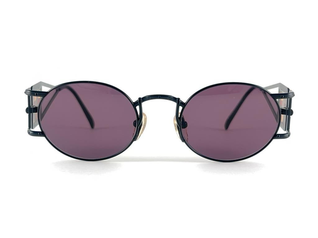 Mint Vintage Jean Paul Gaultier 56 4672 With Side Cups Detailed Frame. 
Purple Lenses That Complete A Ready To Wear Jpg Look. 

Amazing Design With Strong Yet Intricate Details.
Design And Produced In The 1900'S.
A True Fashion Statement


Made In