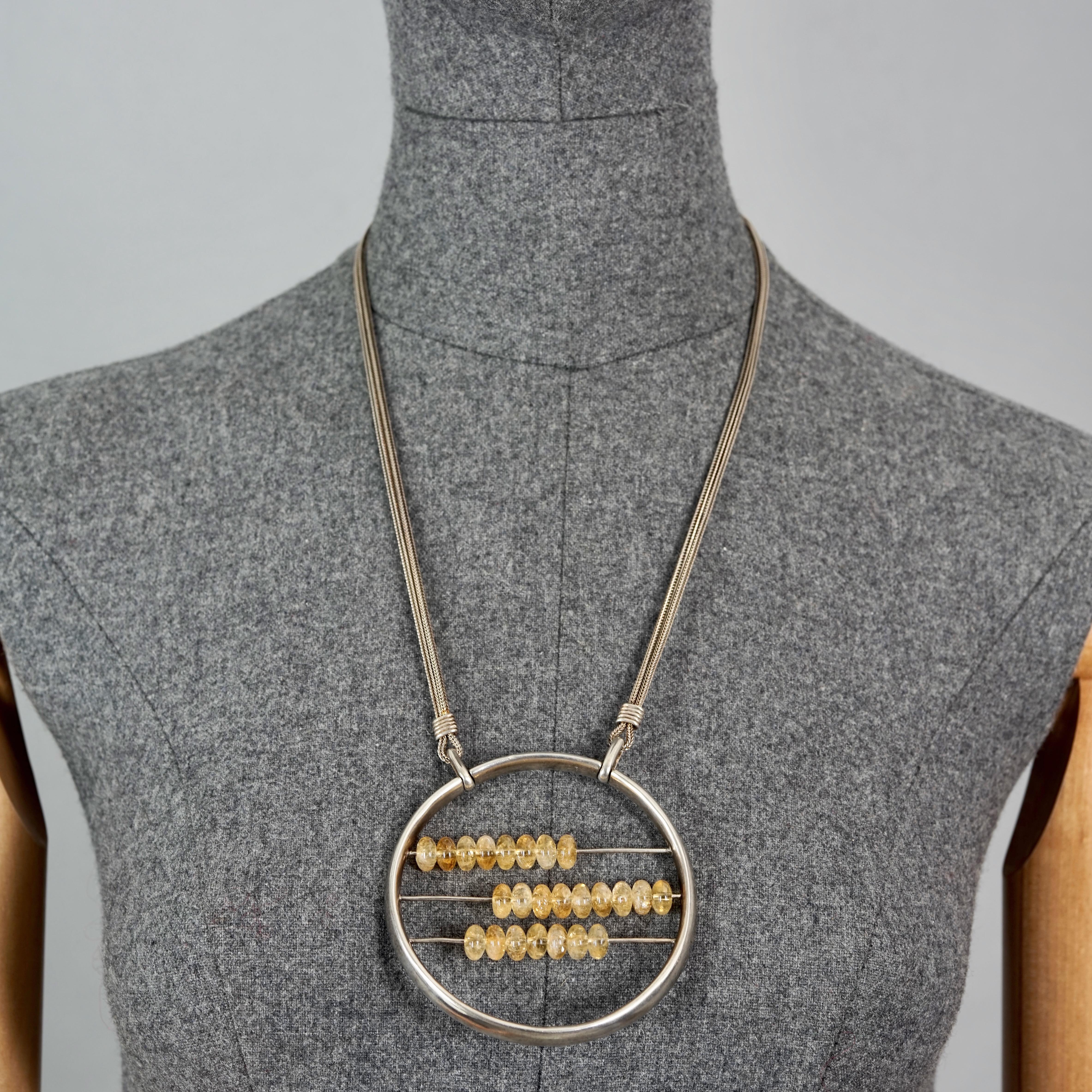 Vintage JEAN PAUL GAULTIER Abacus Medallion Sterling Silver Necklace

Measurements:
Height: 3.15 inches (8 cm)
Width: 3.15 inches (8 cm)
Wearable Length: 23.03 inches to 24.40 inches (58.5 cm to 62 cm) adjustable

Features:
- 100% Authentic JEAN