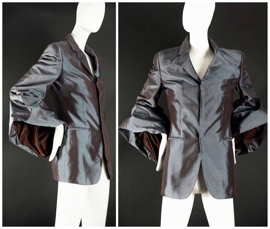 Vintage JEAN PAUL GAULTIER Bell Sleeves Iridescent Blazer Jacket

Measurements taken laid flat, please double bust and waist:
Shoulder: 16.14 inches (41 cm)
Sleeves: 25.19 inches (64 cm)
Width Cuffs: 16.53 inches (42 cm)
Bust: 18.50 inches (47