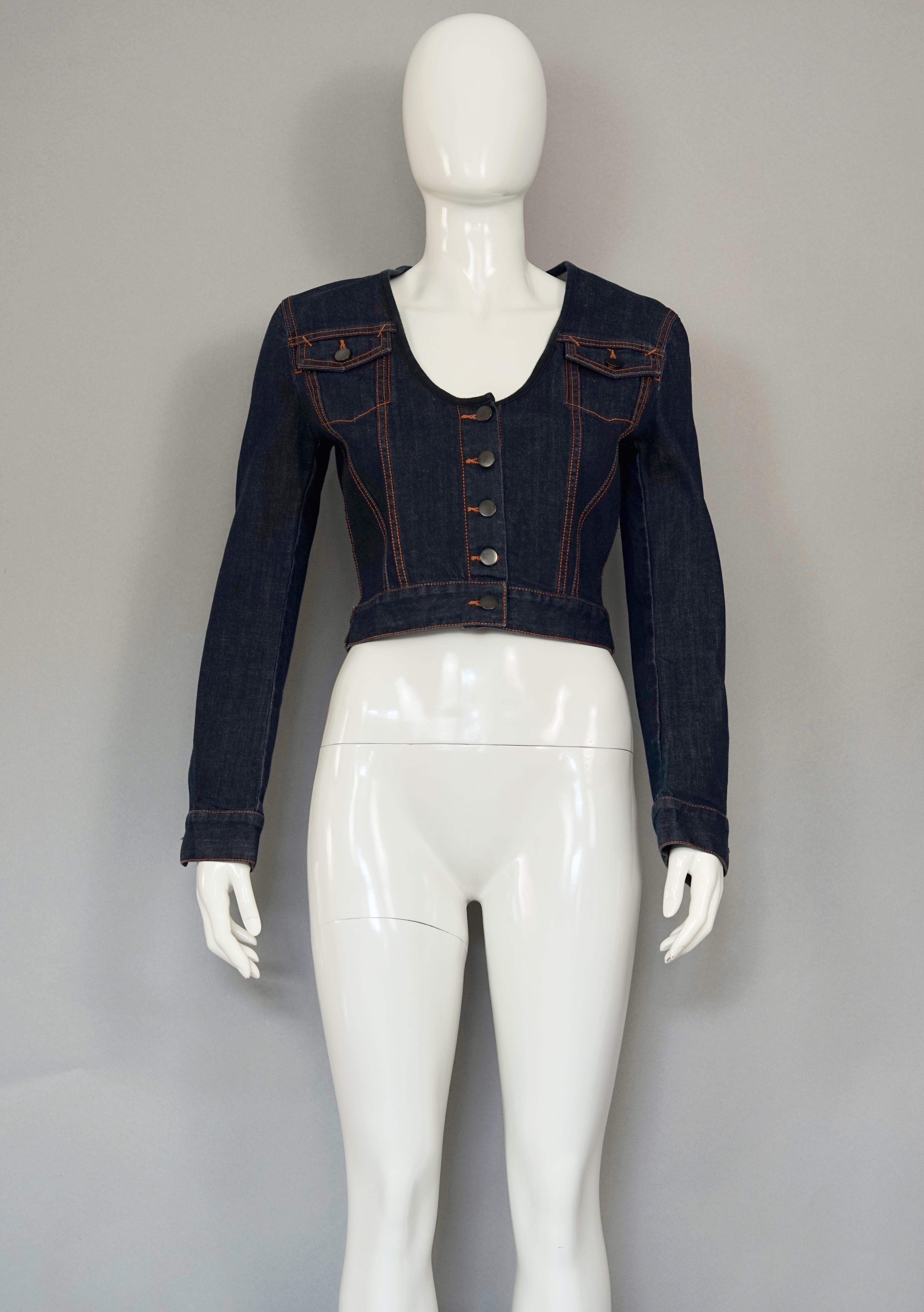 Vintage JEAN PAUL GAULTIER Dark Blue Denim Cropped Jacket

Measurements taken laid flat, please double bust and waist:
Shoulder: 15.35 inches (39 cm)
Sleeves: 22.83 inches (58 cm)
Bust: 17.71 inches (45 cm)
Waist: 14.17 inches (36 cm)
Length: 18.5