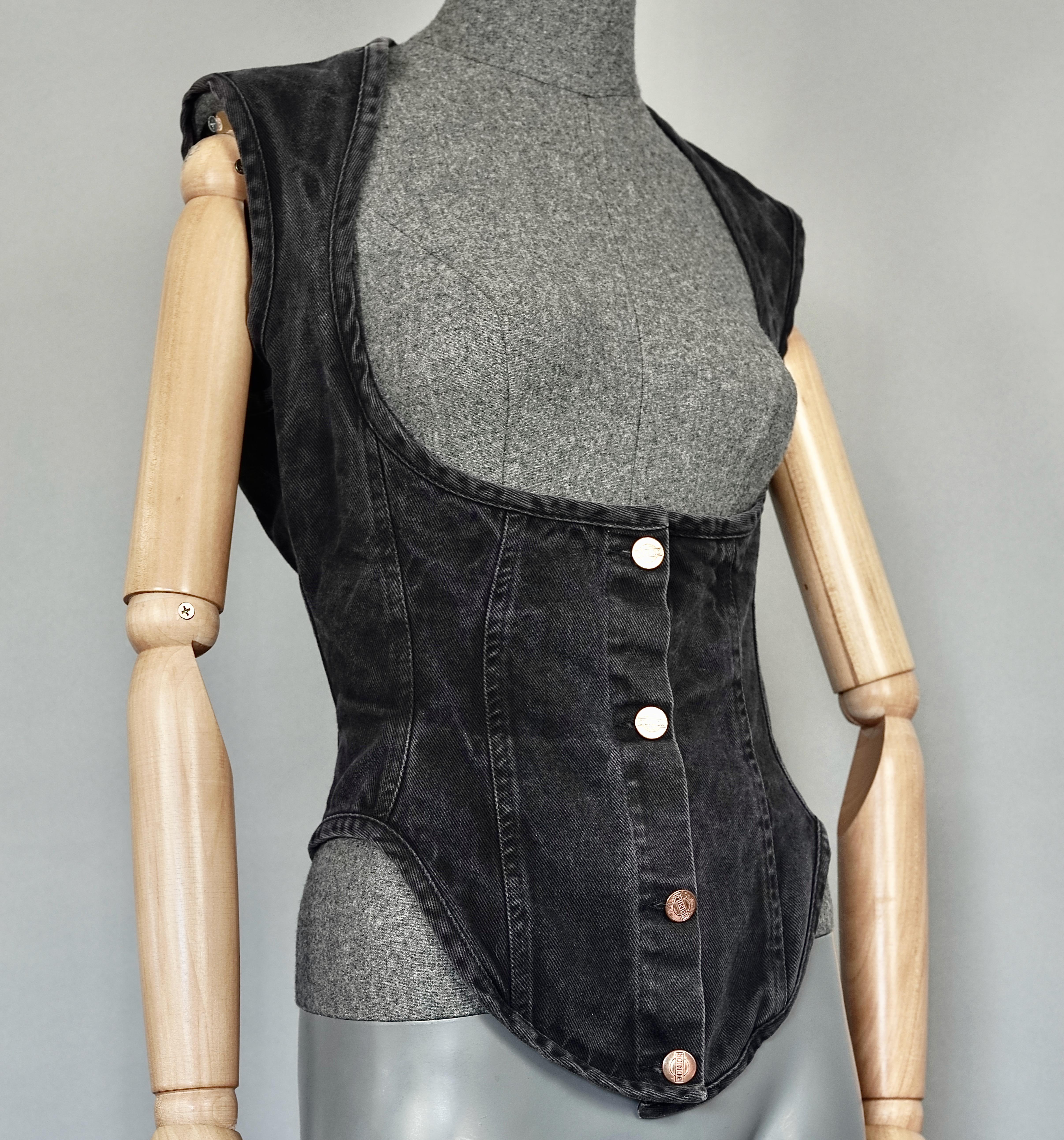 Vintage JEAN PAUL GAULTIER  Denim Corset Vest Top

Measurements taken laid flat, please double bust and waist:
Shoulder: 14.96 inches (38 cm)
Bust: 16.33 inches (41.5 cm)
Waist: 13.58 inches (34.5 cm)
Length: 24 inches (61 cm)

Features:
- 100%