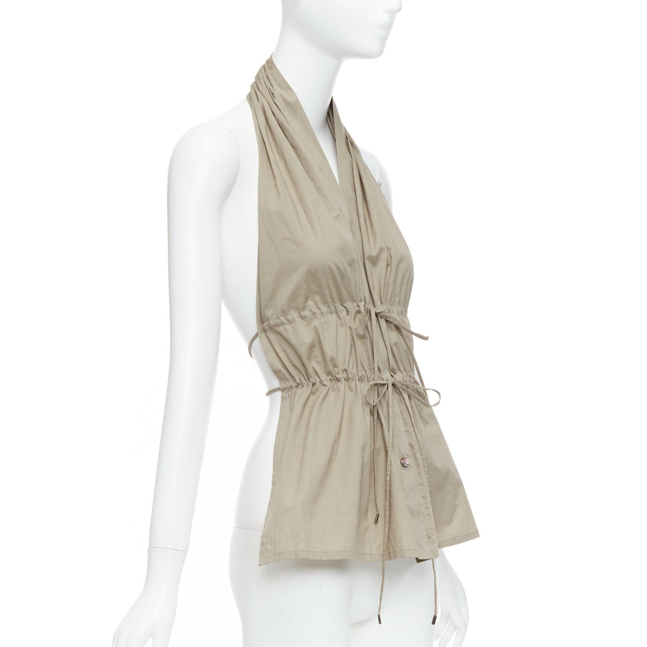 vintage JEAN PAUL GAULTIER khaki cotton halter backless gathered tie top IT38 XS
Reference: TGAS/E00062
Brand: Jean Paul Gaultier
Designer: Jean Paul Gaultier
Collection: FEMME
Material: Cotton
Color: Khaki
Pattern: Solid
Closure: Button
Extra