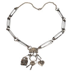 Collier vintage Jean-Paul Gaultier avec épingle de sécurité et clés à cadenas en forme de cœur