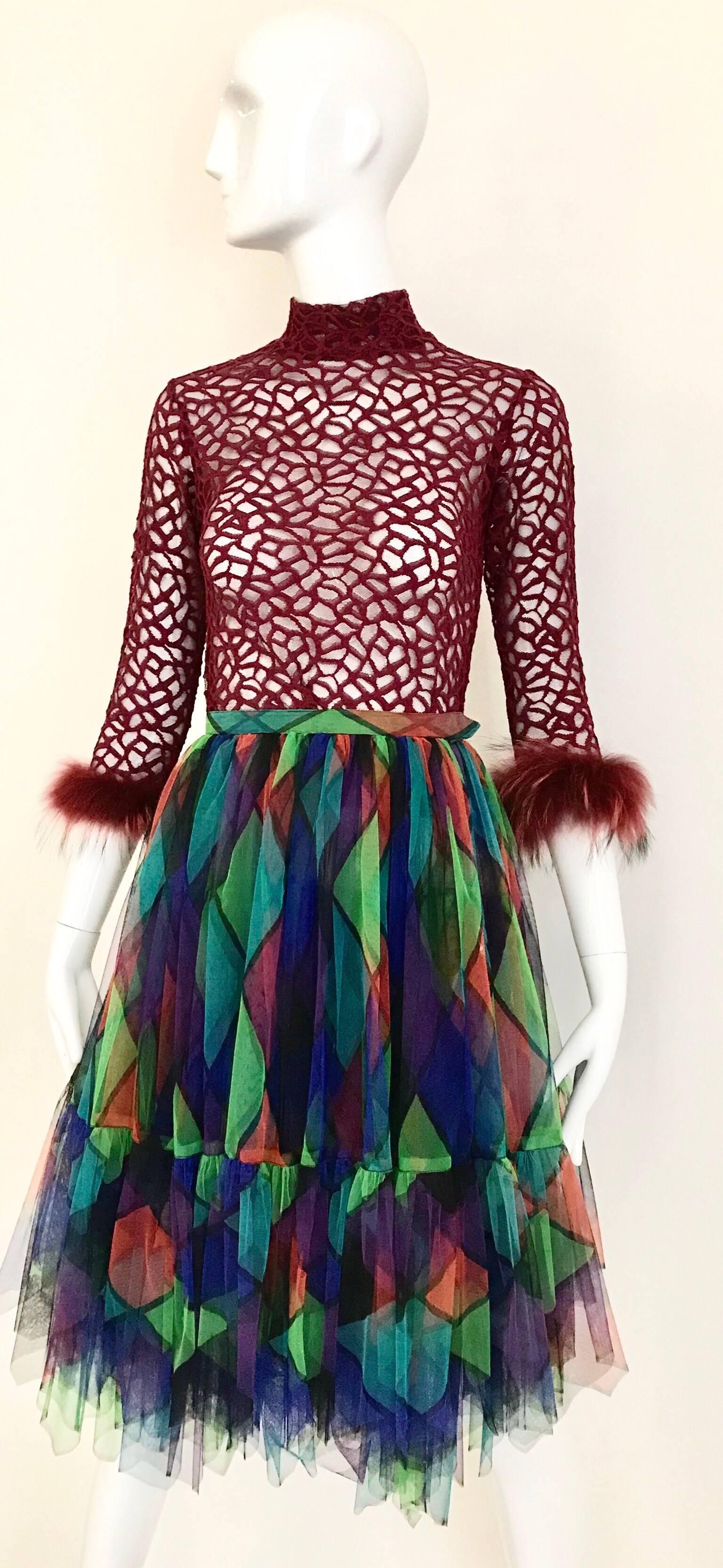 90s Jean Paul Gaultier Maroon mesh viscose top with ostrich sleeves.
Top is styled with Vintage Saint Laurent Harlequin Tulle skirt ( available for purchase at my 1stdibs shop) 
Top is XS. fit size 0/2 small/petite
