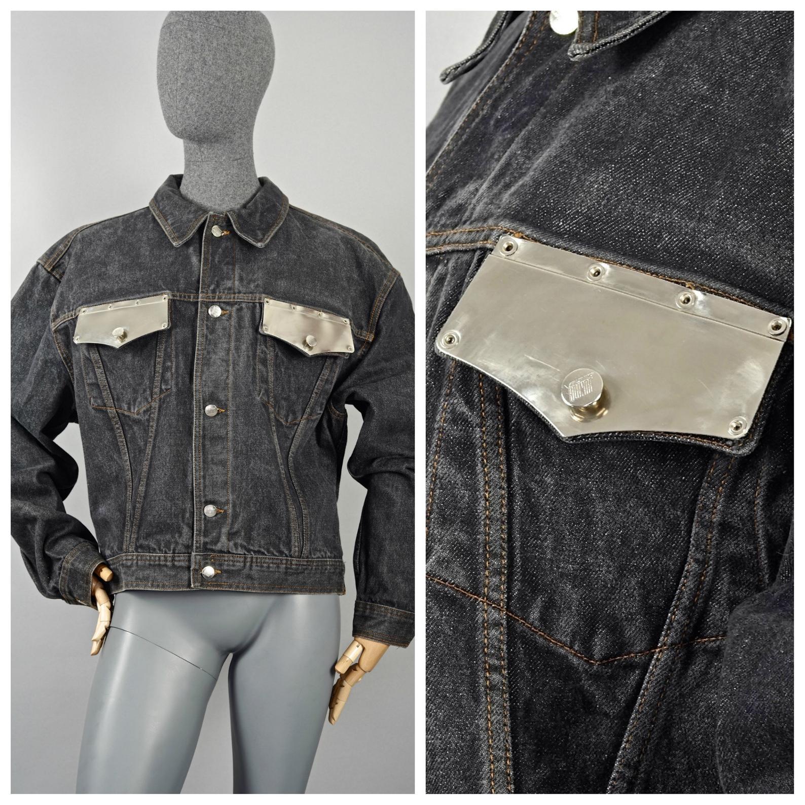 Vintage JEAN PAUL GAULTIER Metal Pocket Denim Jacket

Measurements taken laid flat, please double bust and waist:
Shoulder: 22.05 inches (56 cm)
Sleeves: 24 inches (61 cm)
Bust: 24 inches (61 cm)
Waist: 20.86 inches (53 cm)
Length: 23.82 inches