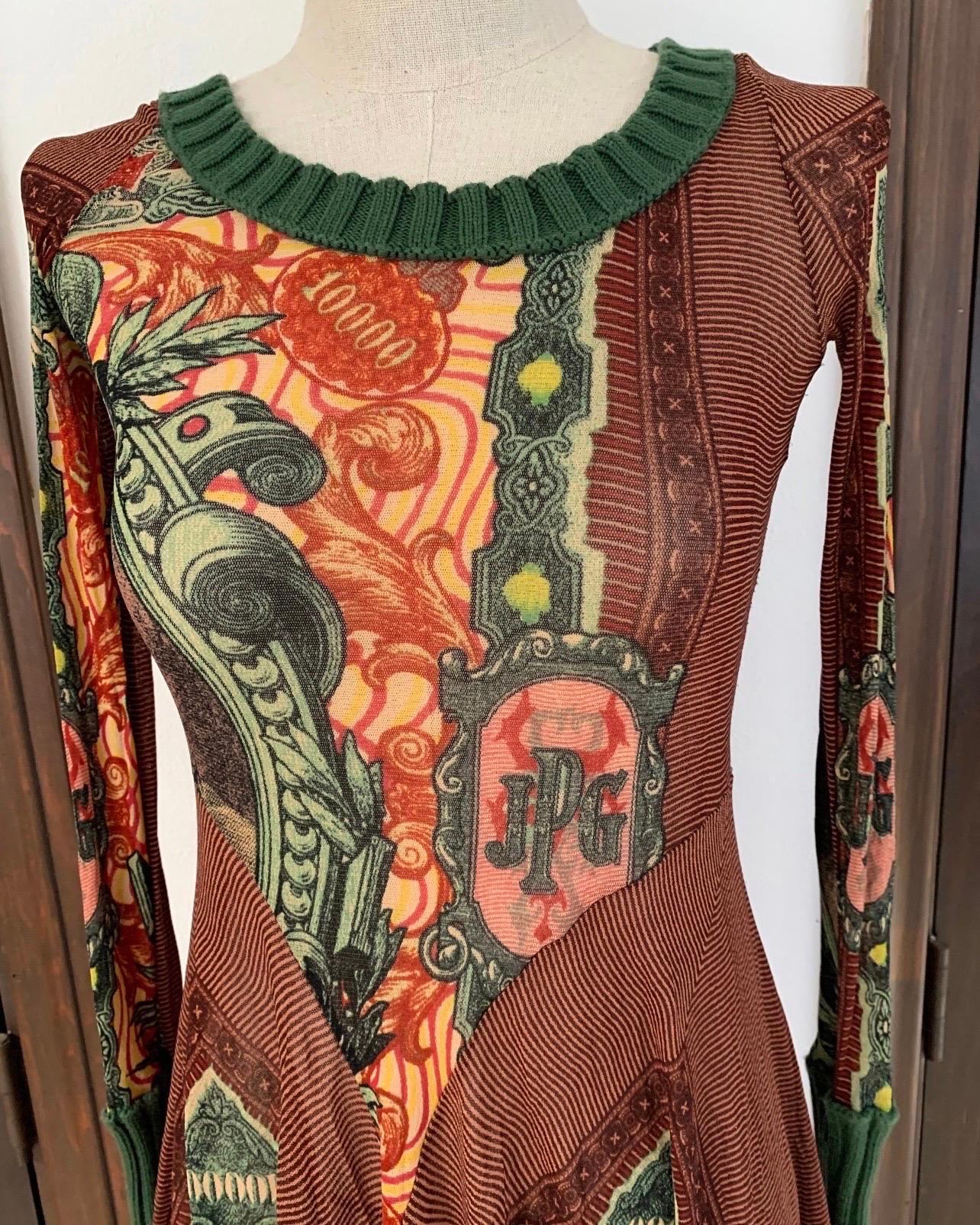 Jean Paul Gaultier Mesh iconic 1996 Caveman Money print dress. Knit trim, mesh layers and GAULTIER adorn the front and back of this timeless piece. 

This item is in excellent condition, appears to be unworn. 

Size S - L  2 - 8 US (very stretchy