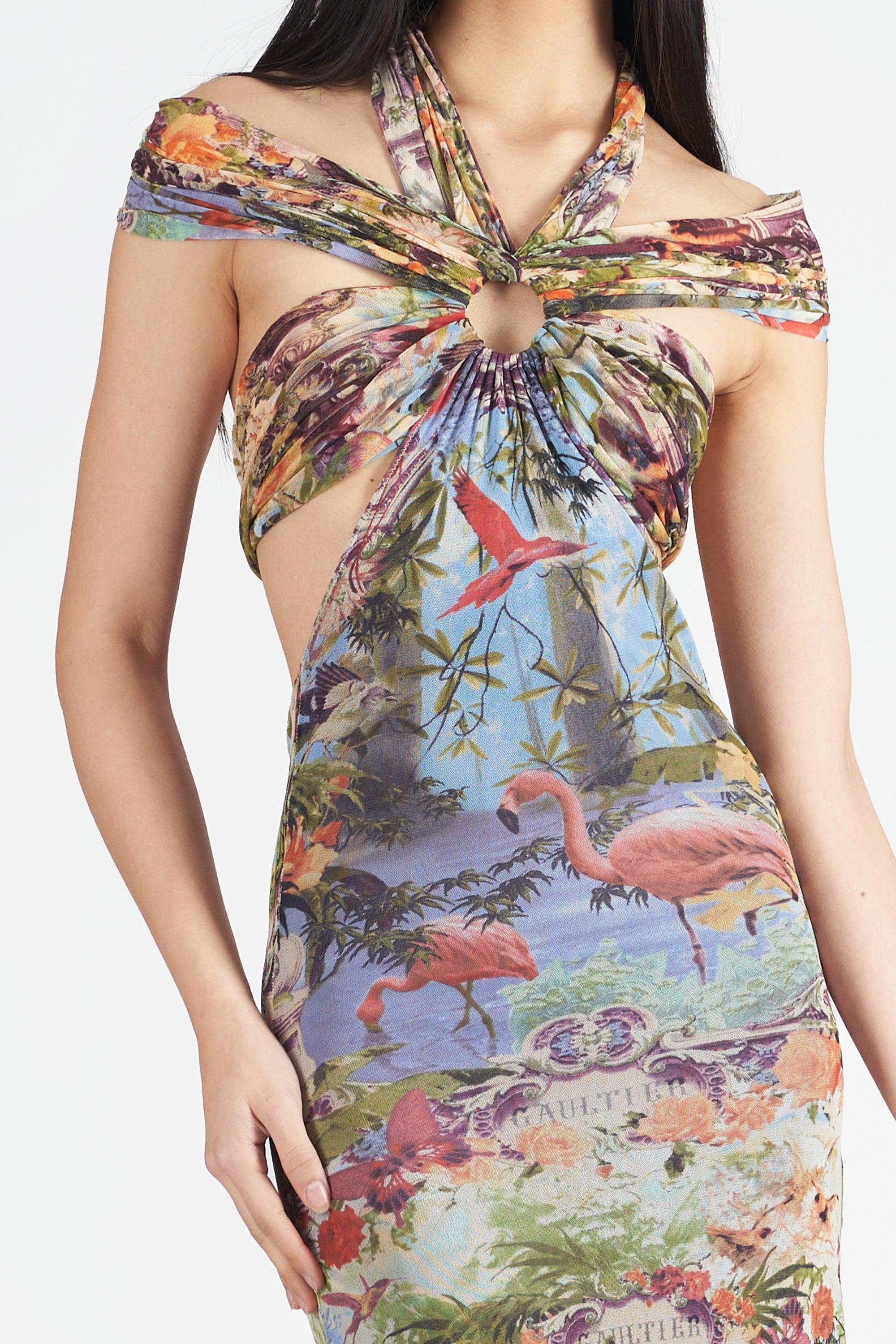 1999 Spring Summer Jean Paul Gaultier ‘Flamingo’ print mesh dress. Features o-ring detail, customisable neckline, open back, double layered fabric and maxi length. In excellent vintage condition.

Brand: Jean Paul Gaultier
Size: UK 8
Color: