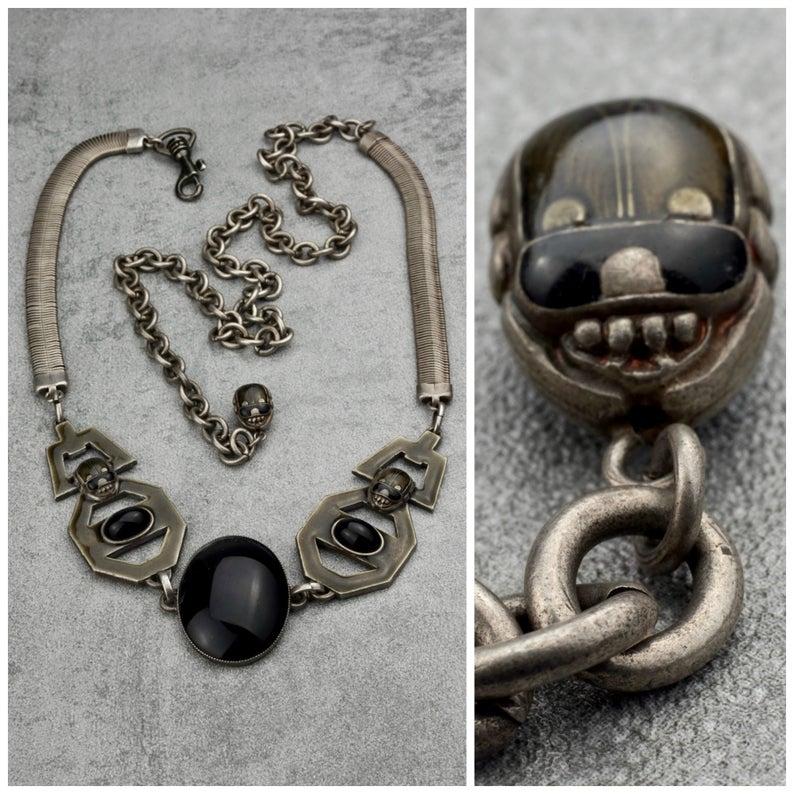 Vintage JEAN PAUL GAULTIER Scarab Snake Chain Necklace Belt

Measurements:
Height: 1.61 inches (4.1 cm)
Wearable Length: 20.86 inches to 40.15 inches (53 cm to 102 cm)

Features:
- 100% Authentic JEAN PAUL GAULTIER.
- 3D Enameled scarab and faux