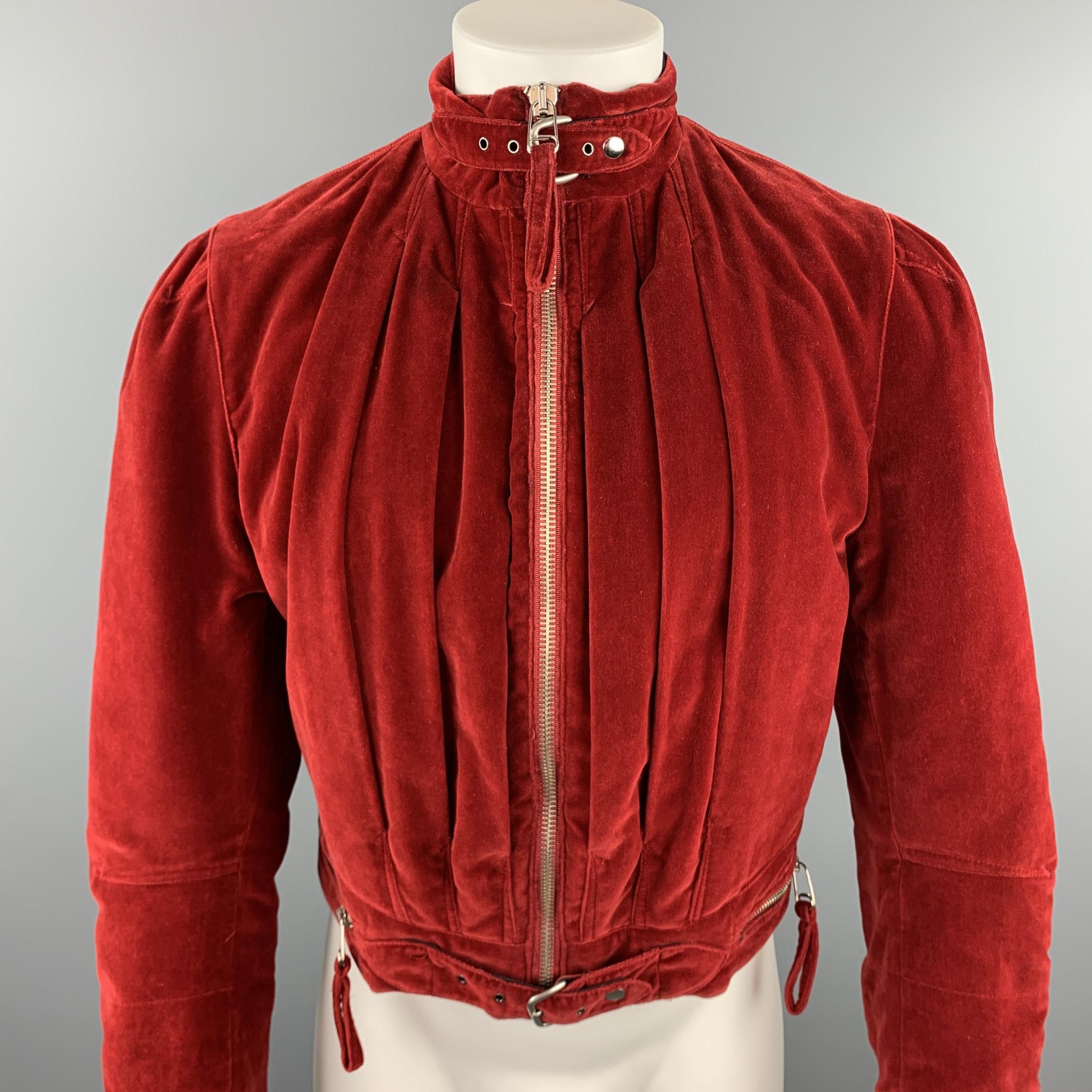 Vintage JEAN PAUL GAULTIER HOMME jacket comes in a red velvet featuring a cropped style, zipper pockets, belted details, and a zip up closure. Discolorations at back. As-Is. Made in Italy.

Good Pre-Owned Condition.
Marked: No size