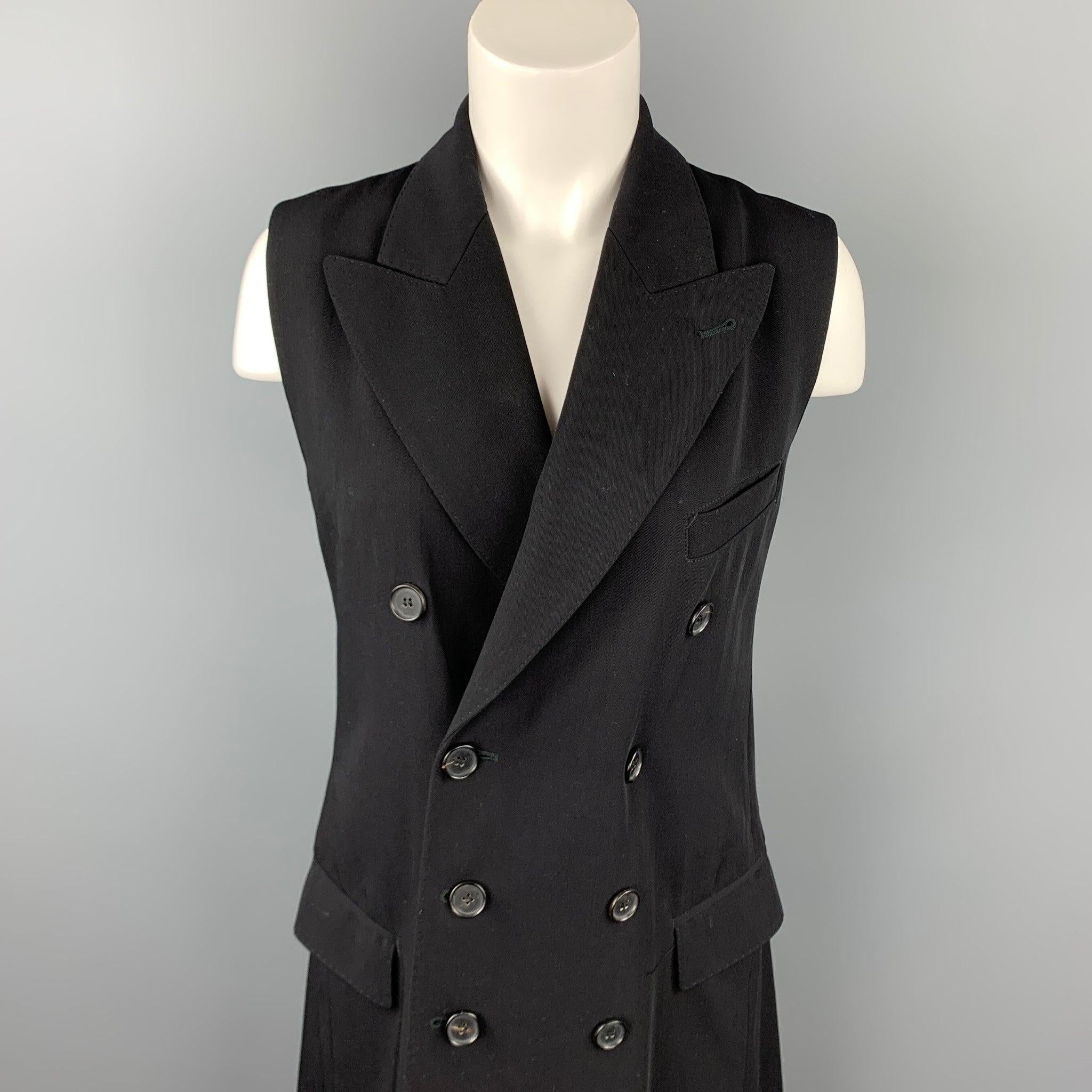Vintage JEAN PAUL GAULTIER vest comes in a black wool blend with a full animal print liner featuring a peak lapel, sleeveless, flap pockets, and a double breasted closure. Made in Italy.Very Good
Pre-Owned Condition. 

Marked:   No size marked