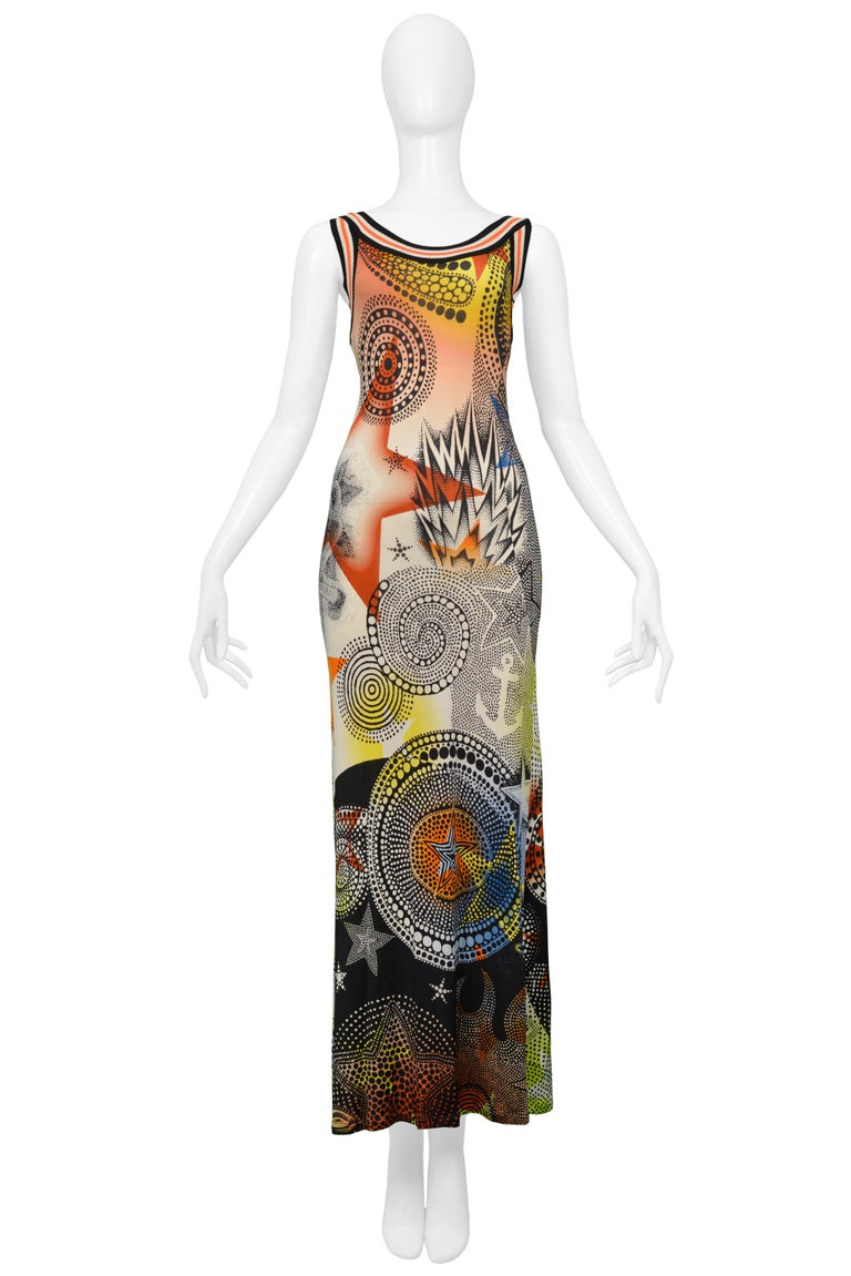 Resurrection Vintage is excited to offer a vintage Jean Paul Gaultier multicolor maxi dress featuring knit striped athletic straps and trim along the sides and back center seam, graphic dot, star, eye and anchor print with nautical rope cut-out back