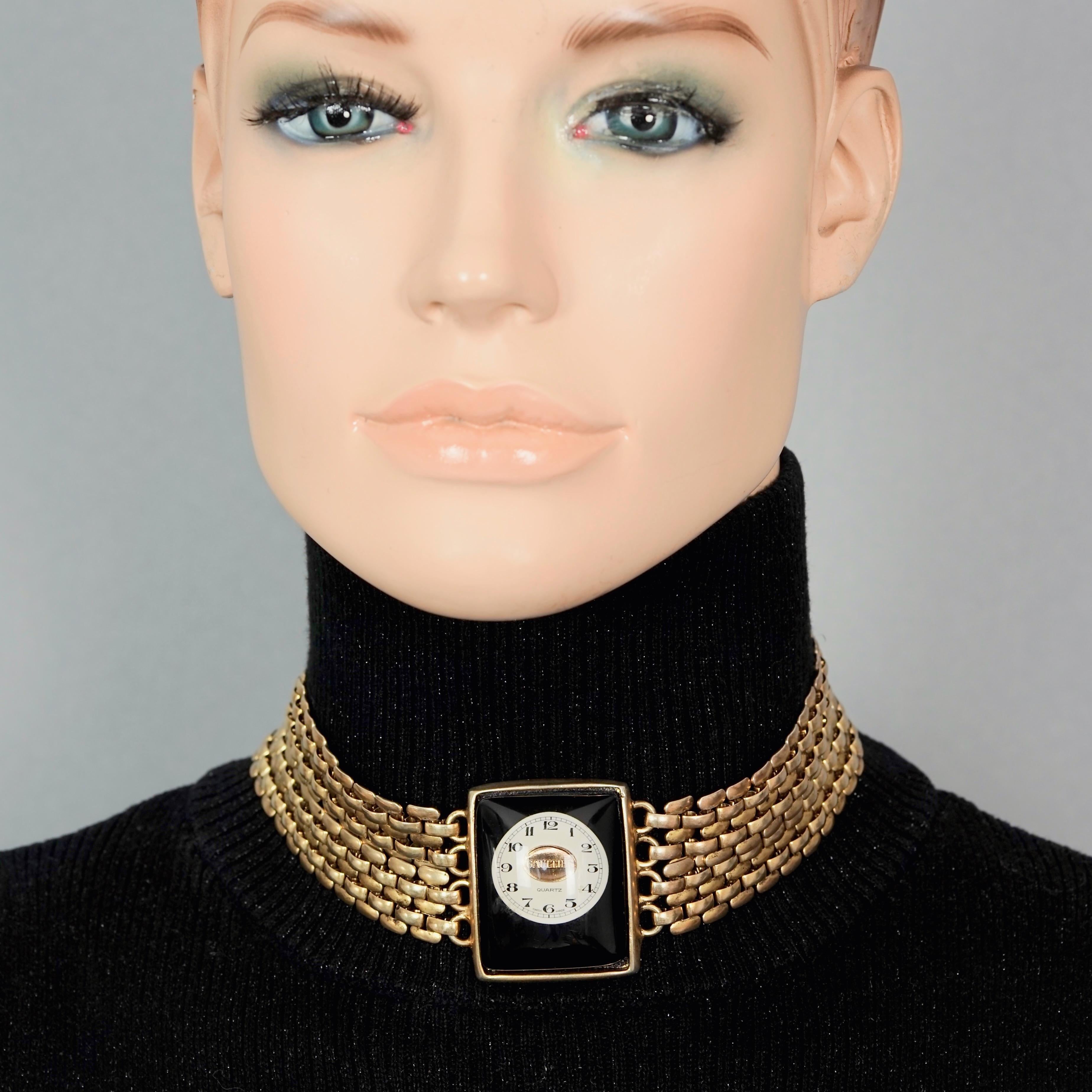 Vintage JEAN PAUL GAULTIER Steampunk Watch Face Lucite Choker Necklace

Measurements:
Height: 1.65 inches (4.2 cm)
Wearable Length: 12.99 inches (33 cm) to 15.75 inches (40 cm)

Features:
- 100% Authentic JEAN PAUL GAULTIER.
- Steampunk, lucite and