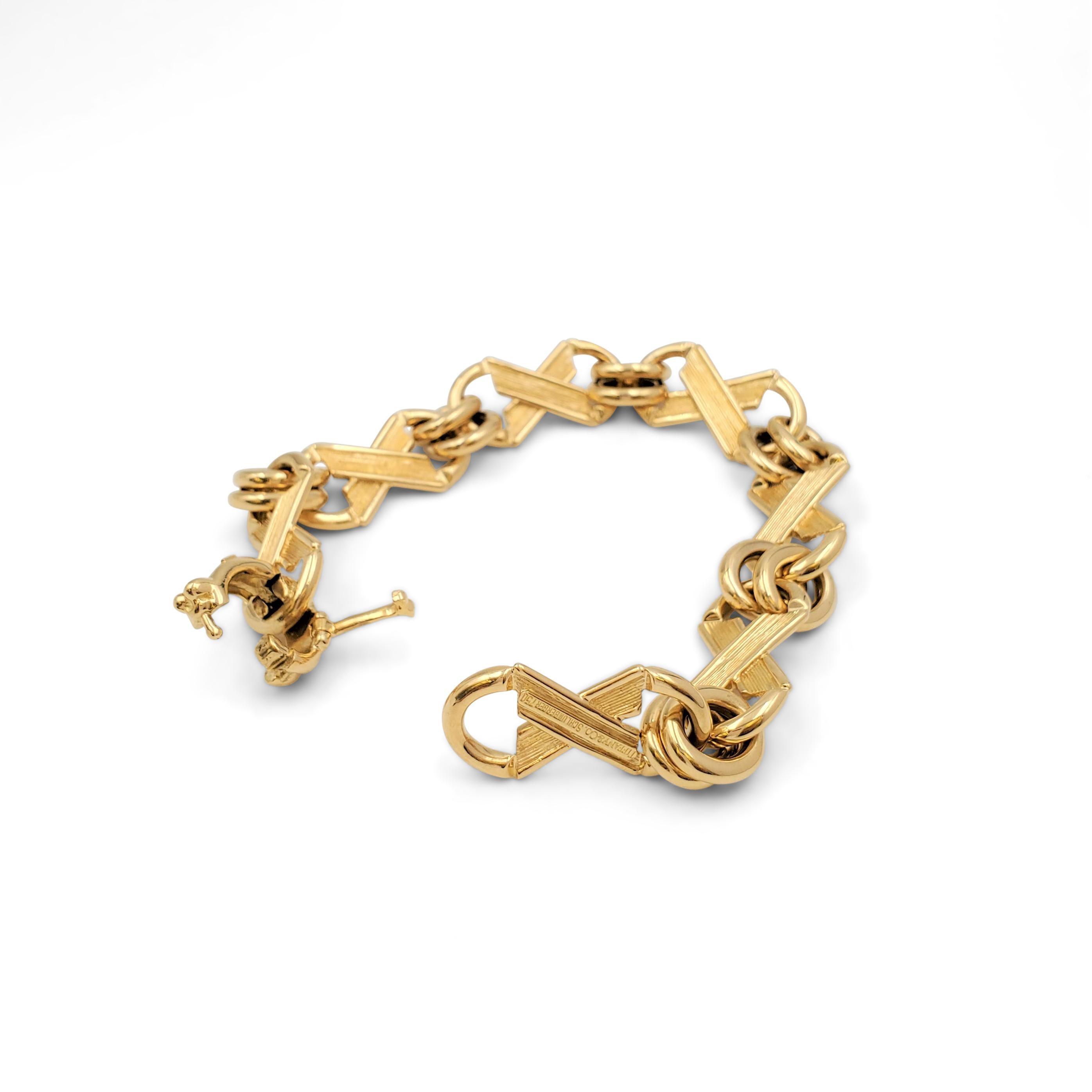 gold x and o bracelet