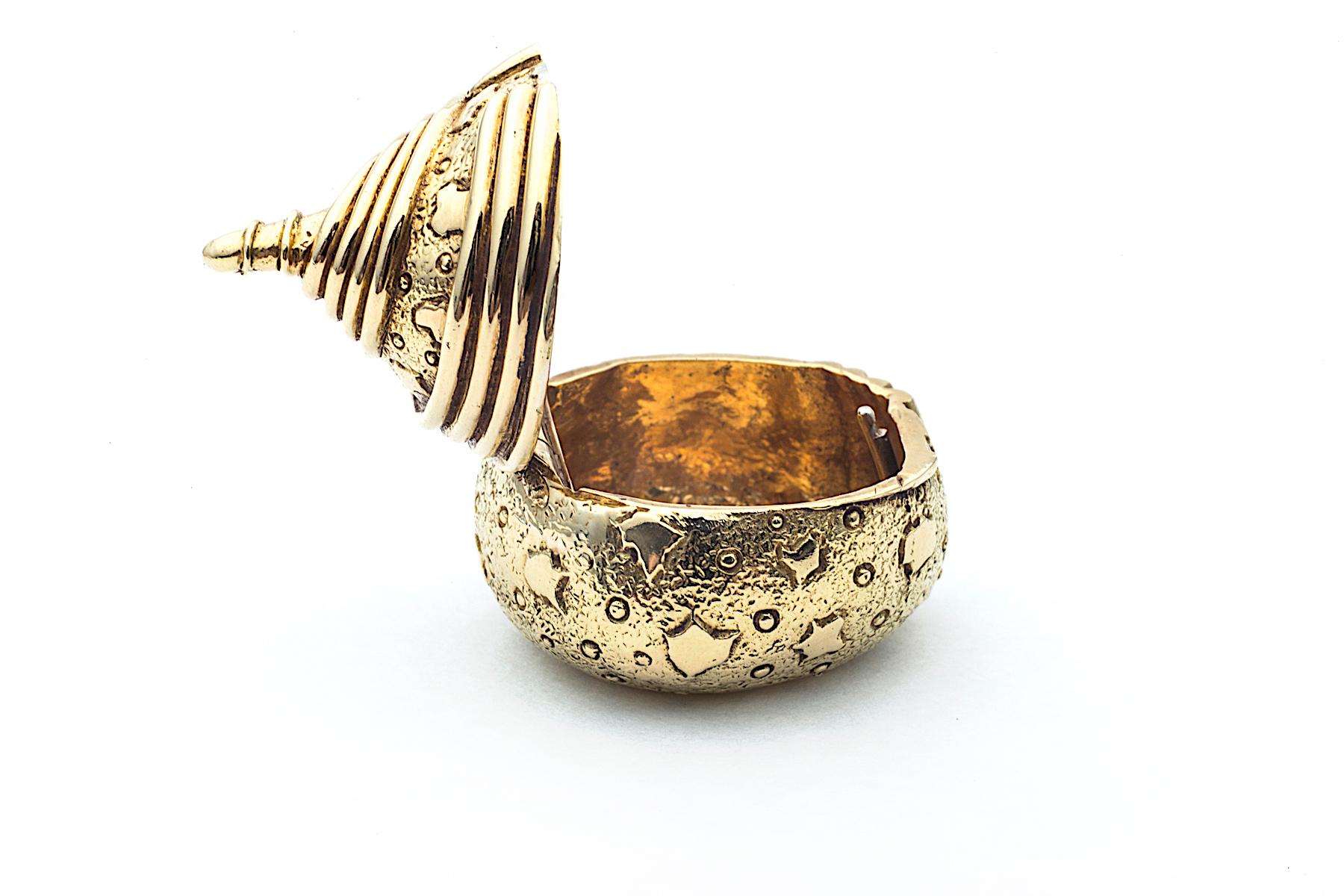 This vintage Jean Schlumberger for Tiffany & Co. decorated golden acorn pill box will quickly become your most coveted accessory.  With a hinged top, this small but precious collectible can hide a tiny treasure and stand guard on your night table or