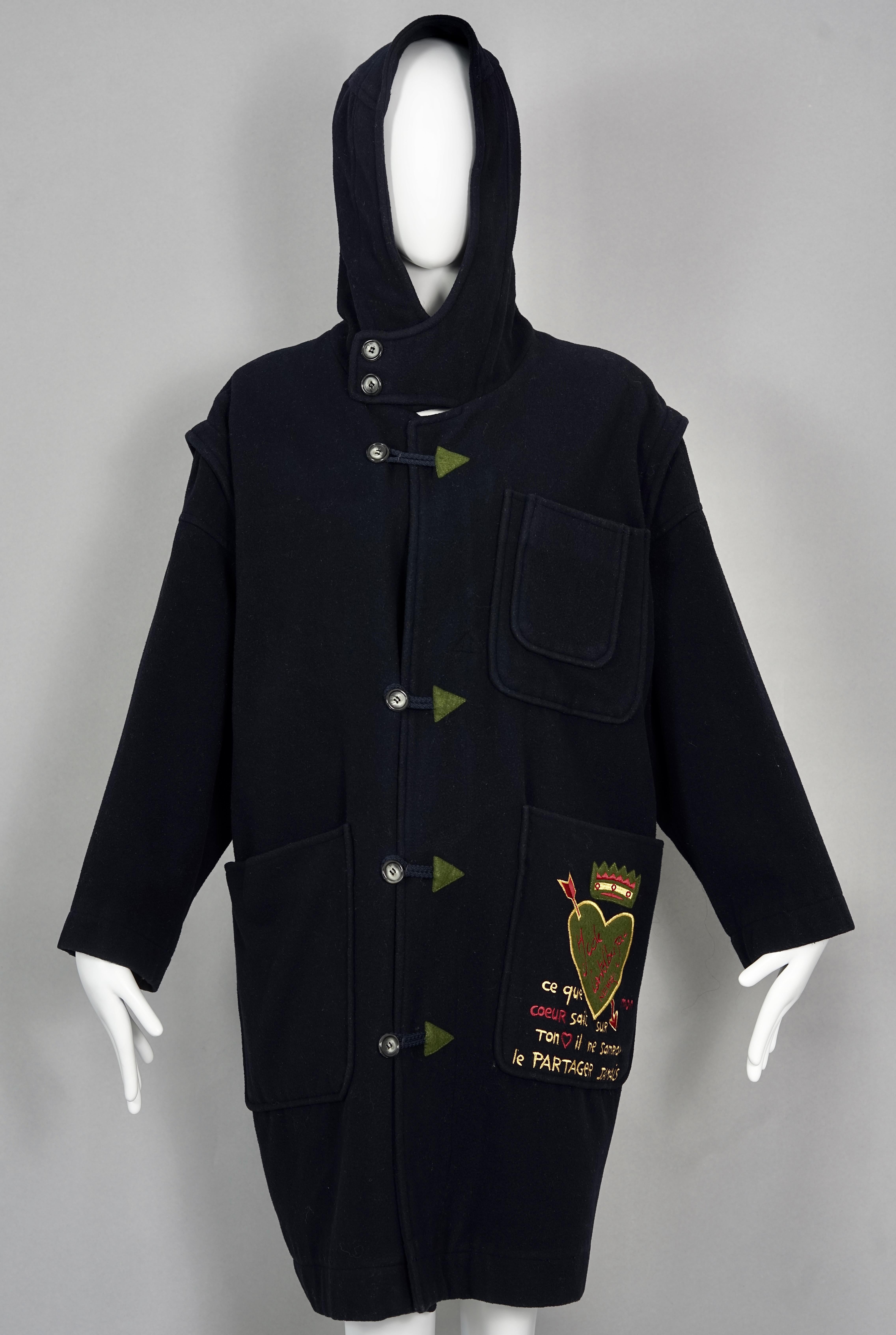 Vintage JEANS CHARLES de CASTELBAJAC Arrows Large Pockets Hooded Duffle Coat

Measurements taken laid flat, please double bust, waist and hips:
Shoulder: 21.25 inches (54 cm)
Sleeves: 20.47 inches (52 cm)
Bust: 25.59 inches (65 cm)
Waist: 25.59