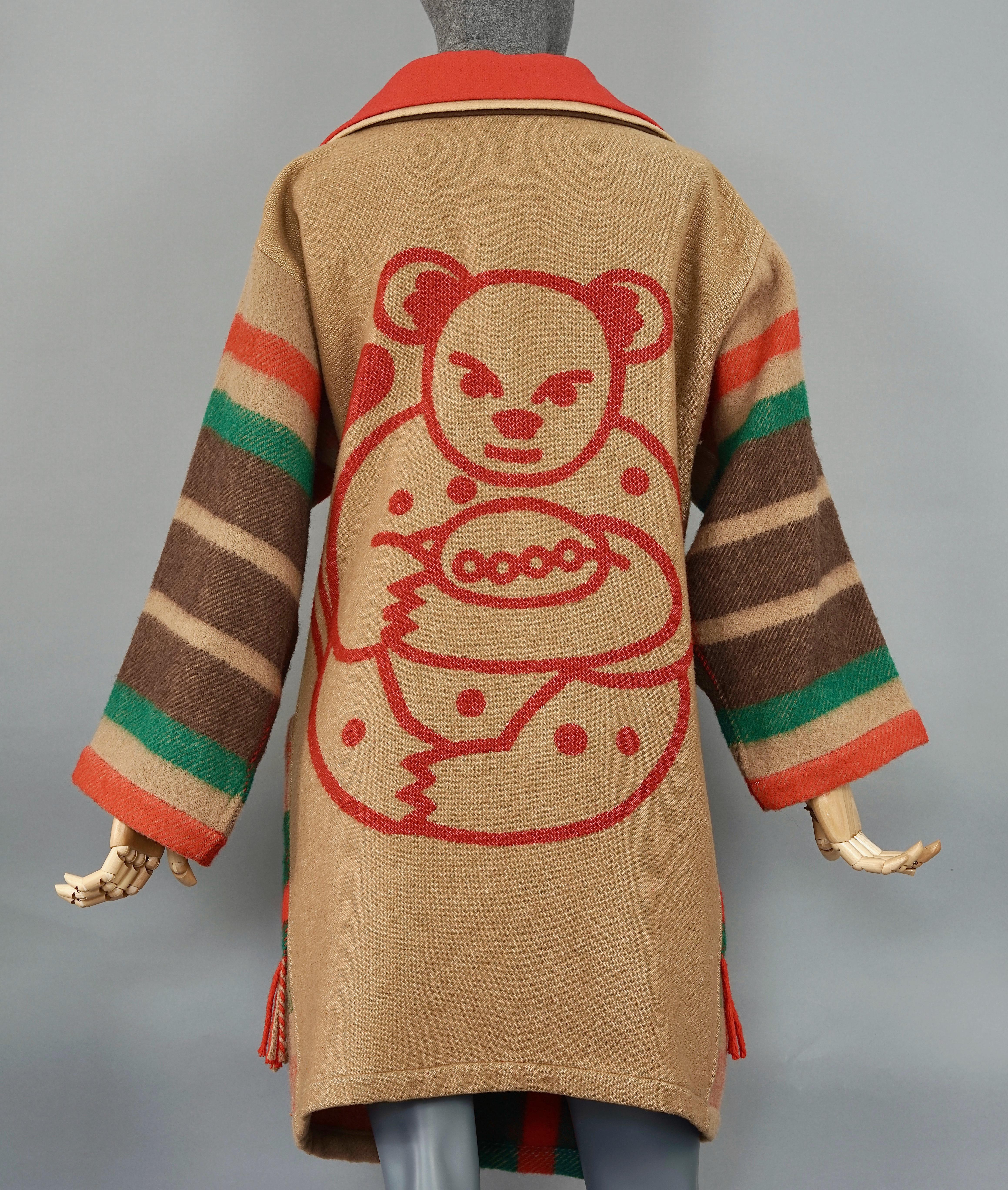 Vintage JEANS CHARLES de CASTELBAJAC Ko and Co Tartan Fringe Teddy Bear Coat

Measurements taken laid flat, please double bust, waist and hips:
Shoulder: 21.25 inches (54 cm)
Sleeves: 20.07 inches (51 cm)
Bust: 20.86 inches (53 cm)
Waist: 20.47