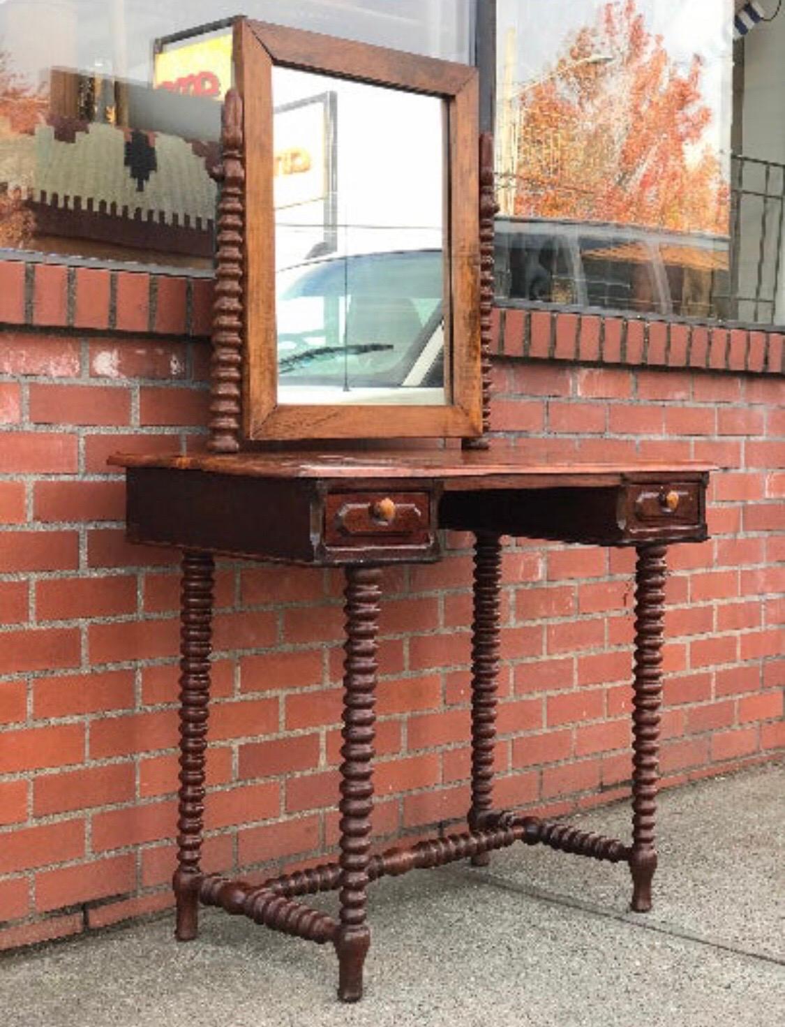 Early nineteenth century walnut console table Vanity from UK with hand turned spindle legs.

Dimensions. 39 W ; 31 H ; 18 D
 58