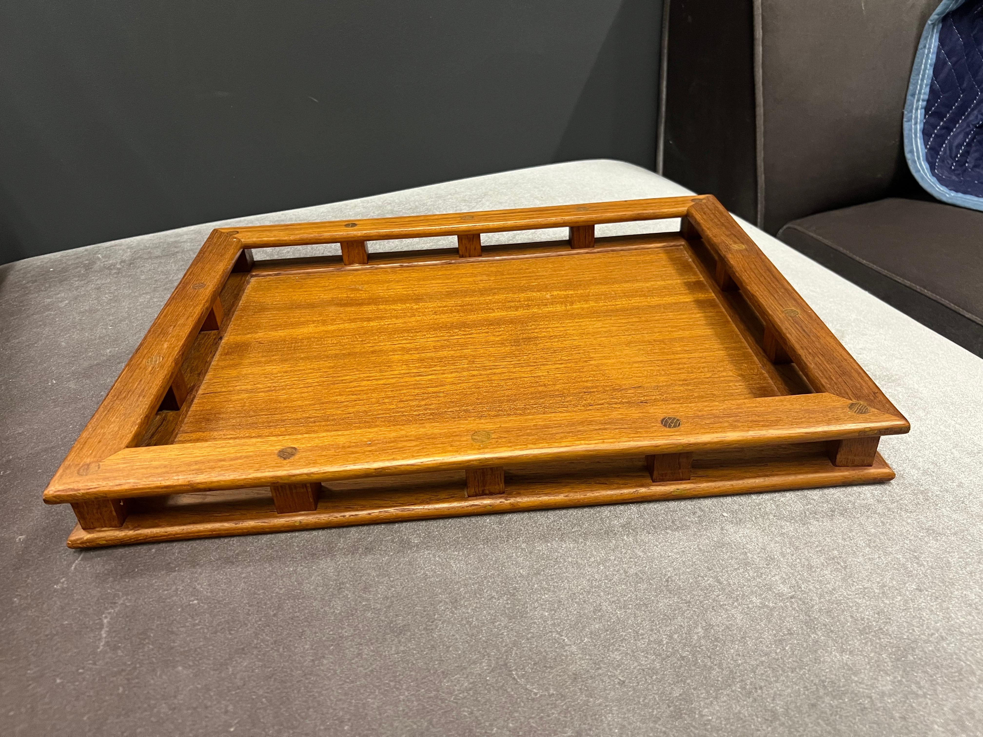 Vintage DANSK Teak Serving Tray  designed by Jens Quistgaard with Captain's Wood Rails.  Would look great on a cocktail ottoman, in the bathroom, or can be used as a serving tray. 

This vintage teak wood serving tray from Dansk is a must-have for