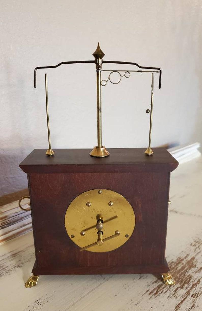 flying pendulum clock for sale