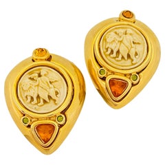 Used JESARA gold glass lion designer runway clip on earrings