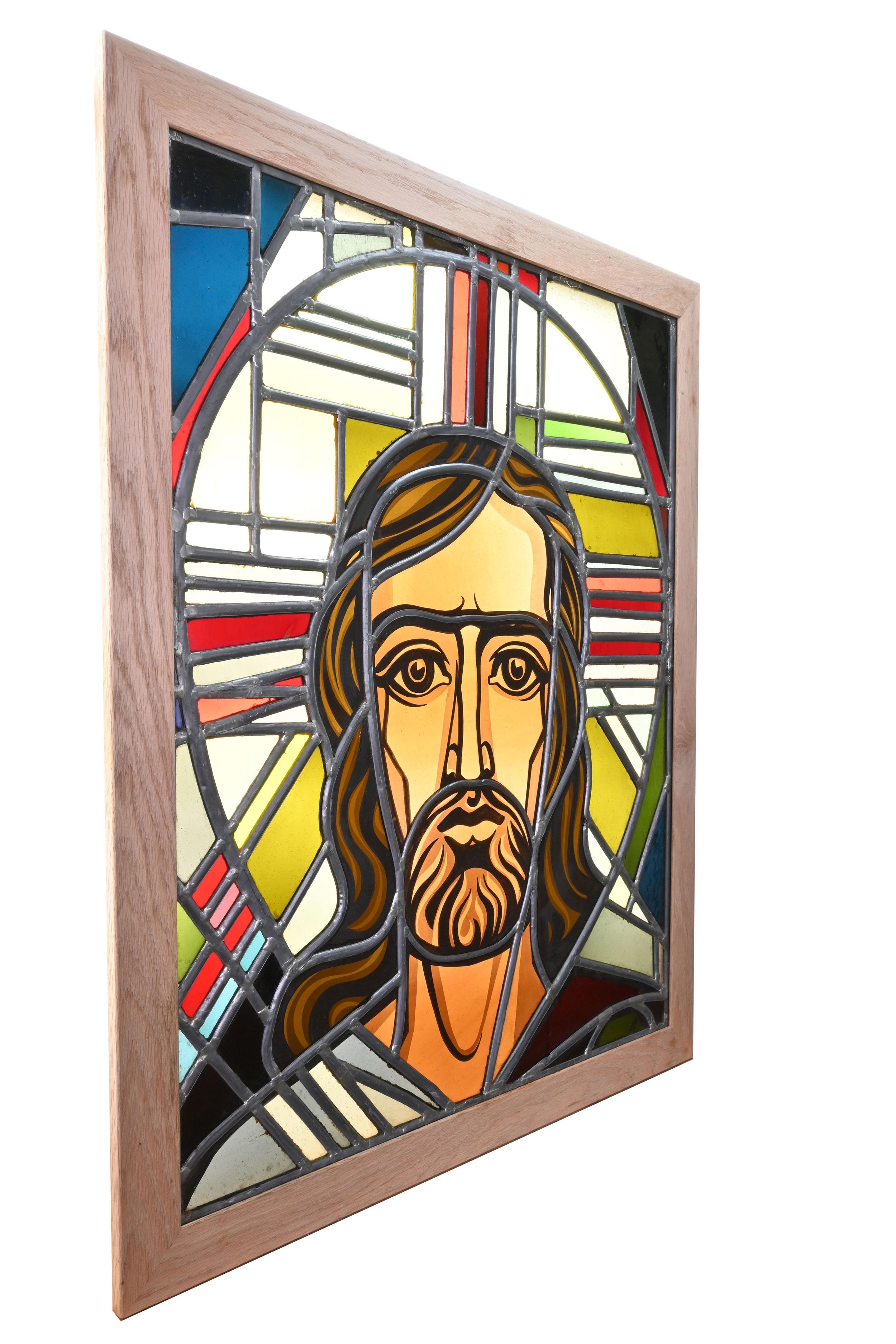 Great condition leaded glass window with colored stained glass pieces,

circa 1920s
Condition: Age consistent / fair
Material: Stained glass
Finish: Original
Country of origin: USA

Dimensions: 29” width x 35 1/2” height x 3/4” thickness of