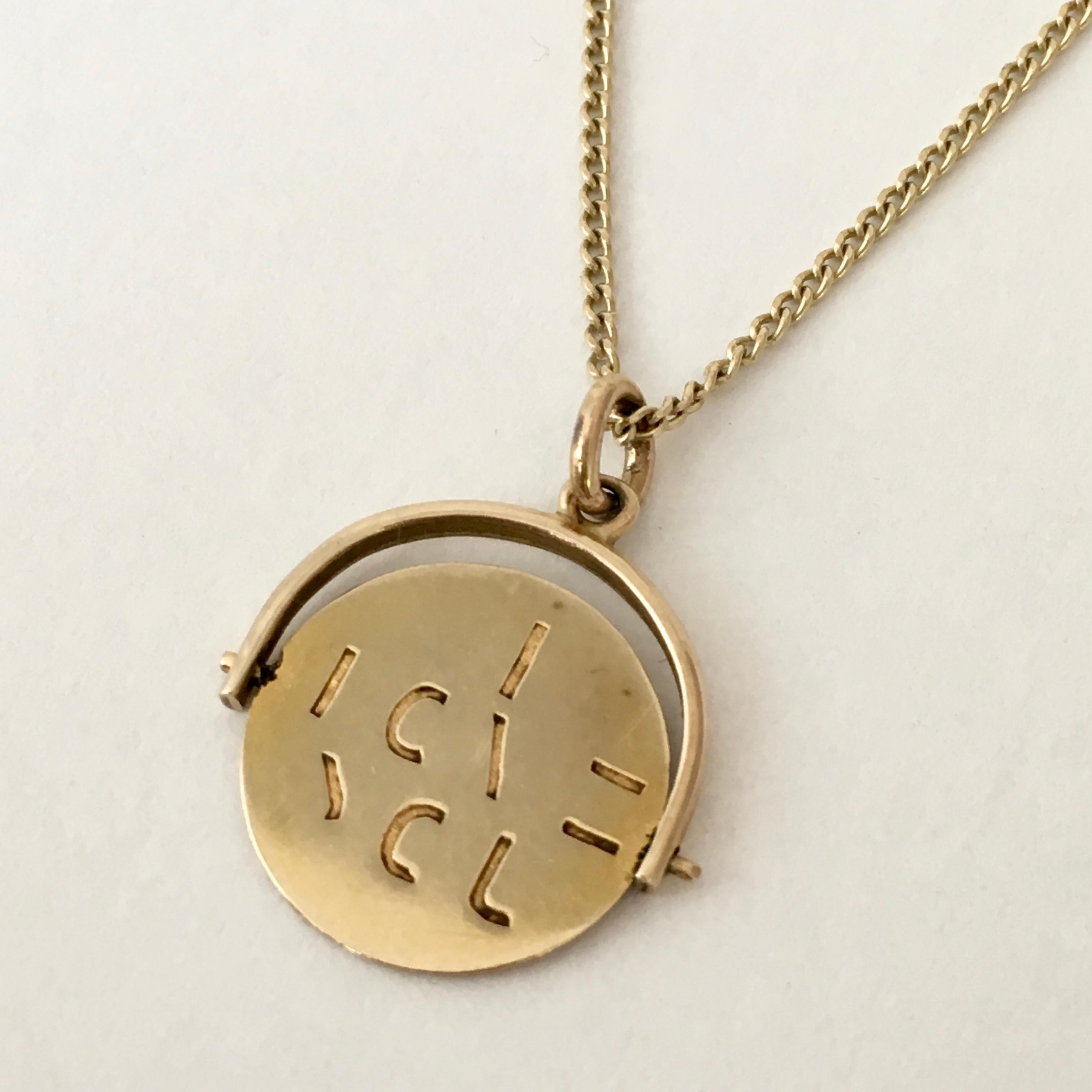 spinning coin necklace