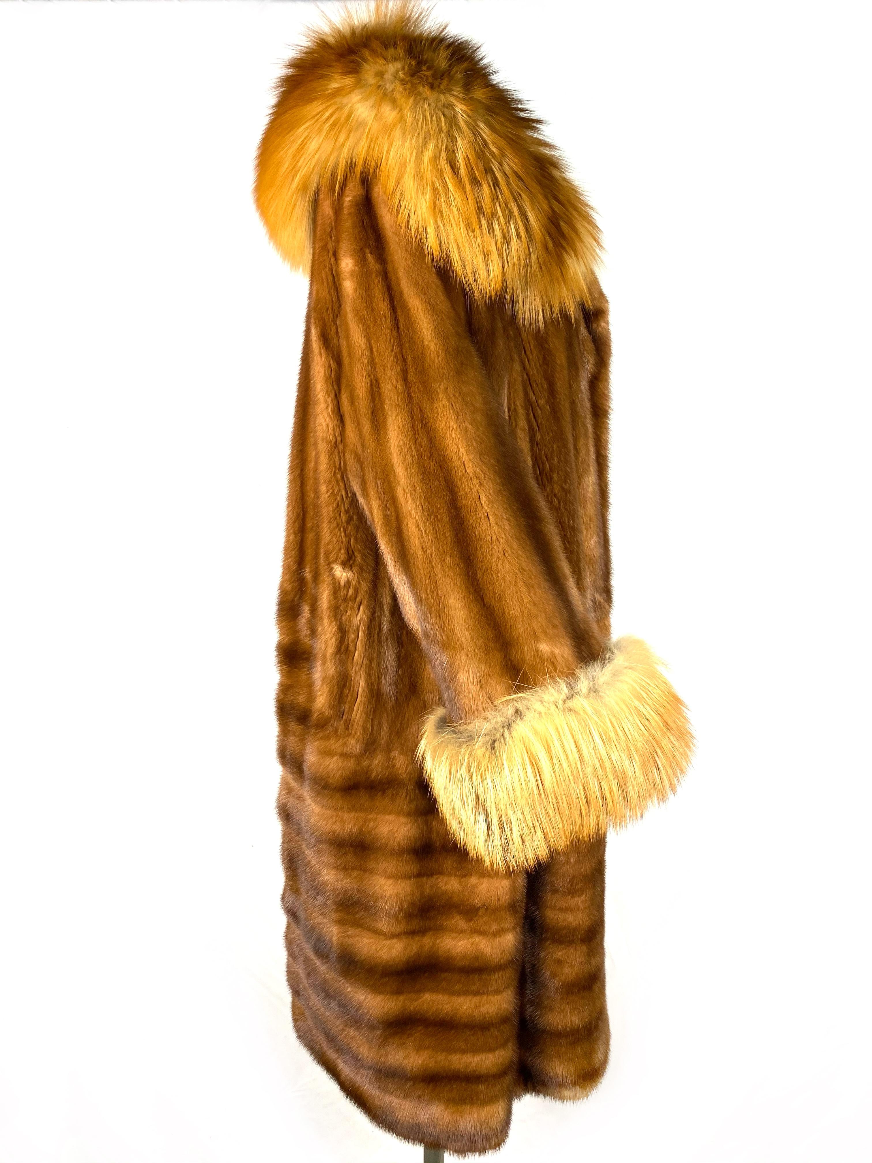 Product details:

Featuring 100% mink fur with collar and pocket on the sides, no closure and 100% silk double lining, mid length.
Made in France.