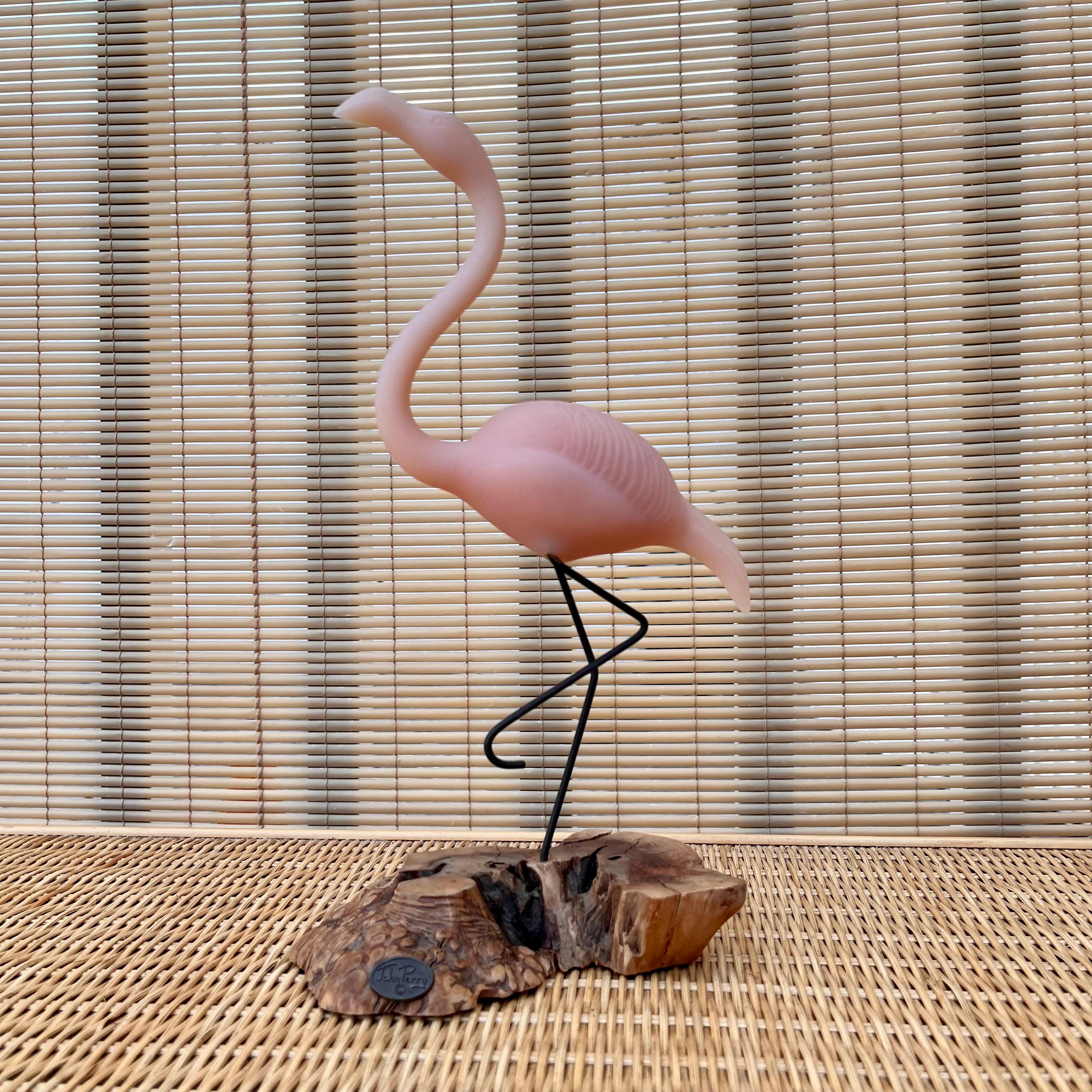 Vintage Original John Perry Pink Flamingo Sculpture With Burlwood Base. Circa 1980s
Features a pink flamingo molded in a compound of resins, pellucida, which is similar to but actually more durable than bisque porcelain. and Mounted on a polished