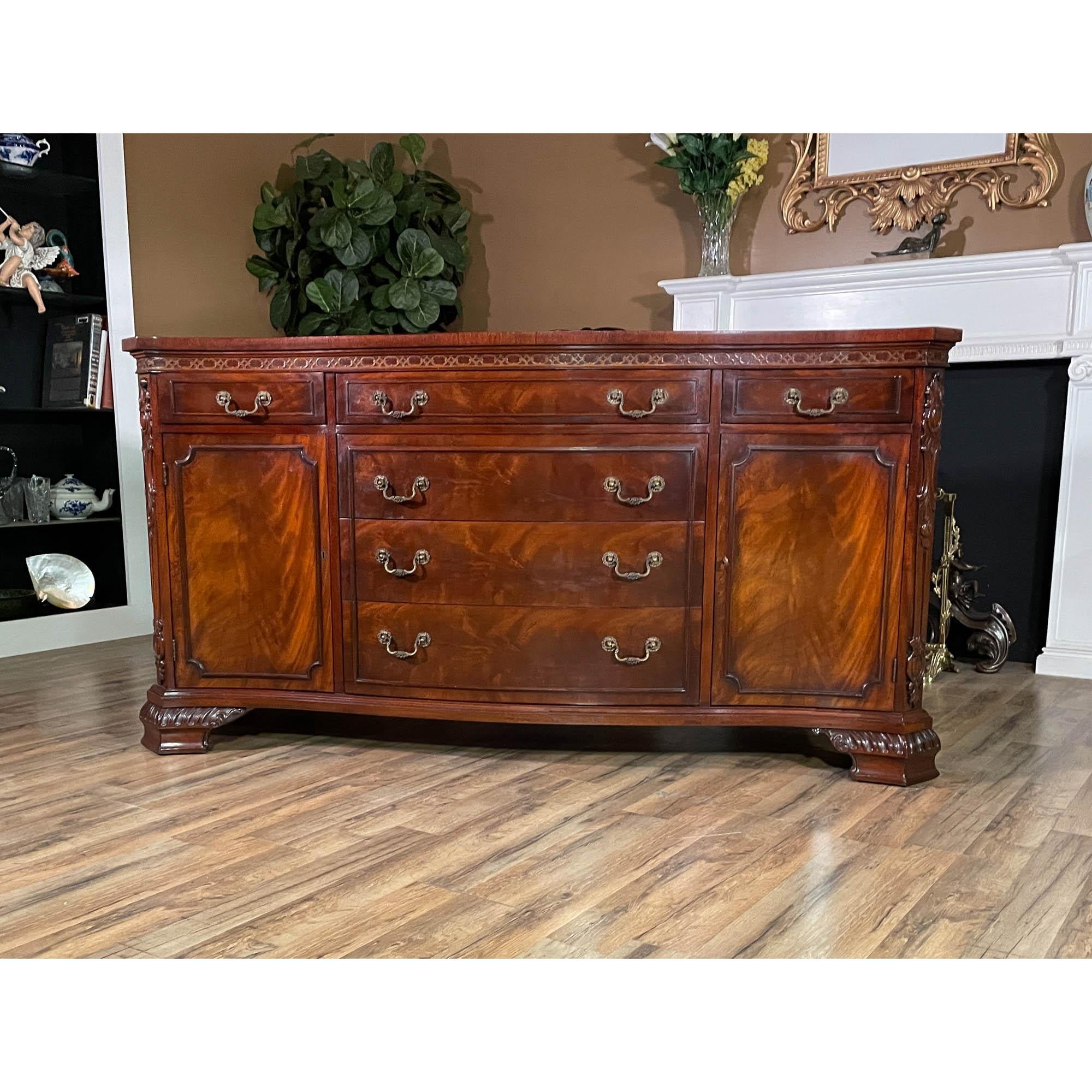 A Vintage Vintage John Stuart Sideboard with serpentine front brought to you by Niagara Furniture. This sideboard is in great original condition and the top has recently been restored to its’ factory original finish. The Vintage John Stuart