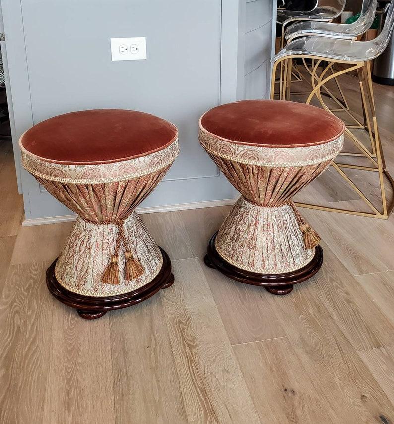 A fabulous pair of high-quality round ottomans / stools by iconic American designer John Widdicomb. circa 1990

Born in the late 20th century, of exceptional quality, craftsmanship and detailing, finished in mid-century modern style, with an
